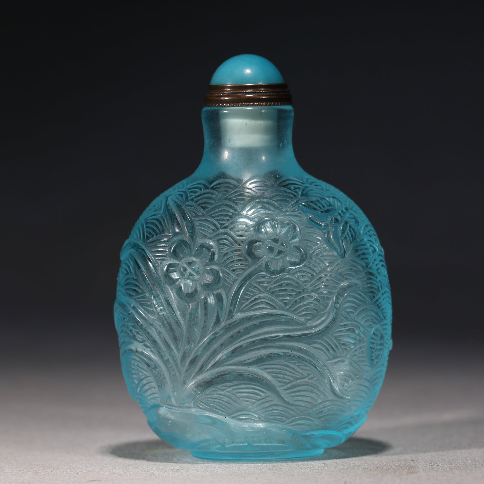 An Exquisite Sky-blue Glass Bird and Flower Pattern Snuff Bottle: An Exquisite Sky-blue Glass Bird and Flower Pattern Snuff Bottle,Qing Dynasty, China,Qianlong Four-character Mark,Size:2.2in×1.2in×3.1in 天蓝色琉璃花Ɣ