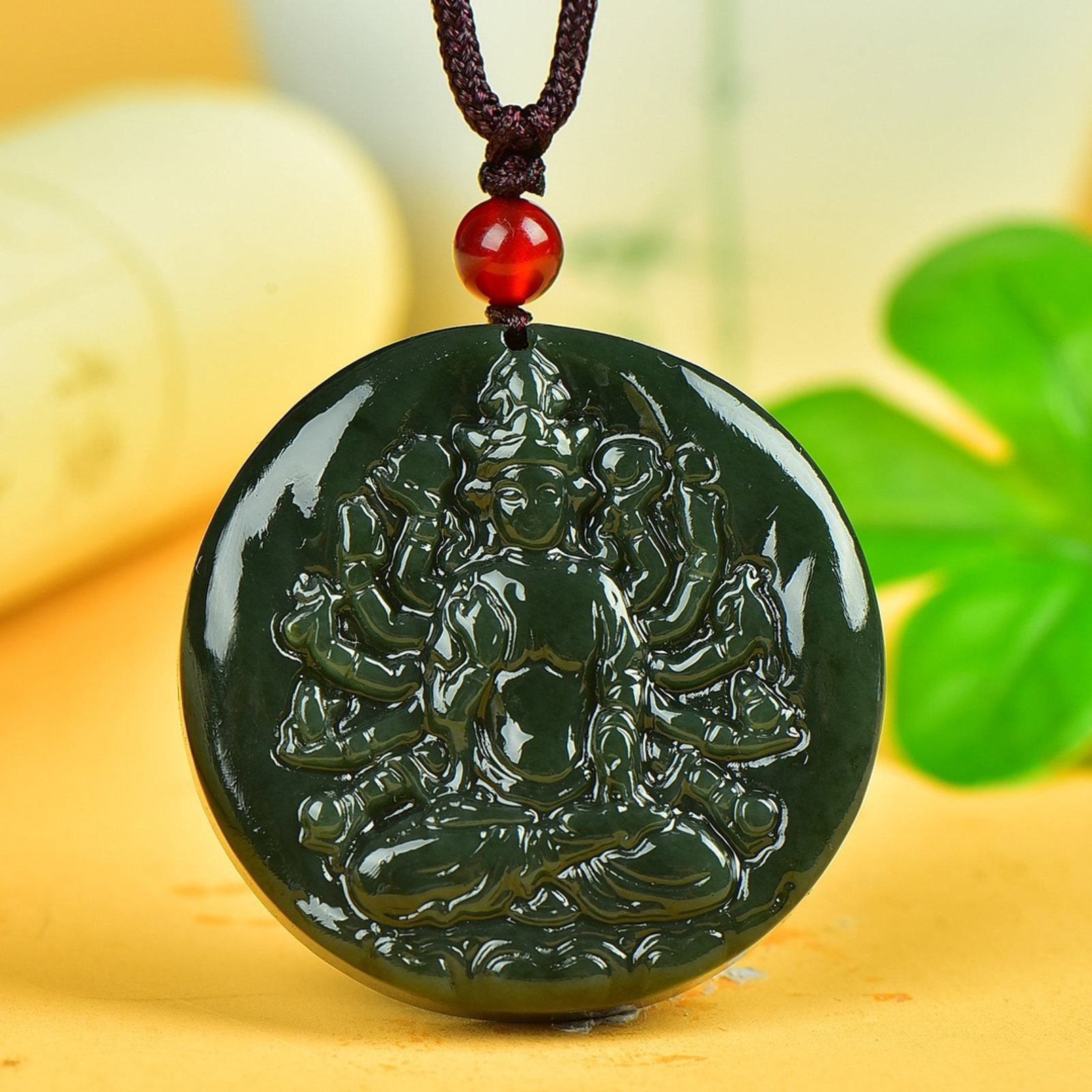 An Exquisite Jasper Statue of Thousand-hand Guanyin Pendant: An Exquisite Jasper Statue of Thousand-hand Guanyin Pendant,Size:40mmx40mm 碧玉千手观音挂件