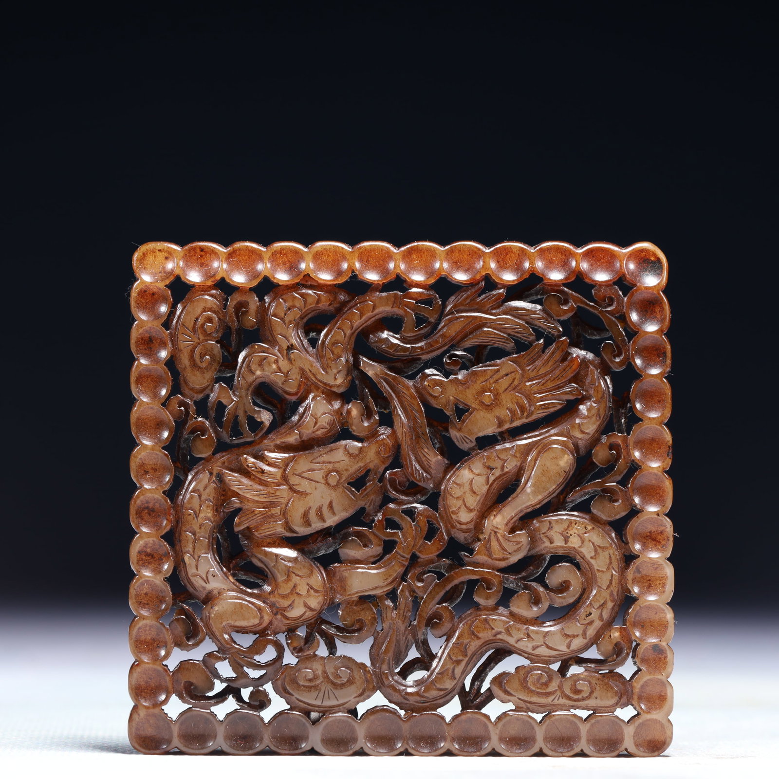 An Exquisite White Jade Dragon Pattern Pendant: An Exquisite White Jade Dragon Pattern Pendant,Qing Dynasty,China,Size:3.1inx3in,Weight:78g 白玉龙纹佩,中国清代
