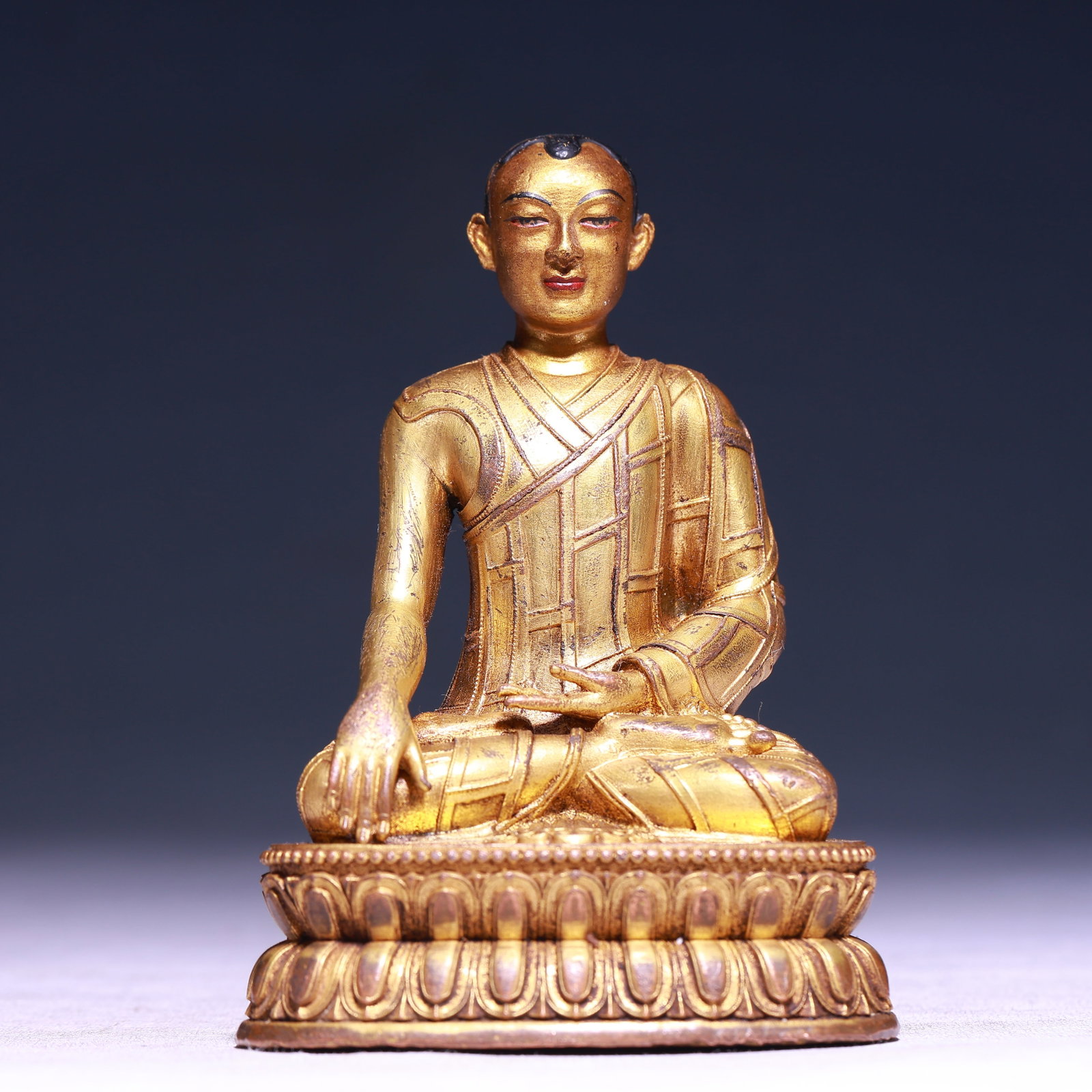 A Solemn Gilt Bronze Statue of Guru: A Solemn Gilt Bronze Statue of Guru,Qing Dynasty,China,Size:3.3inx2.6inx4.7in,Weight:600g 铜鎏金上师像,中国清代