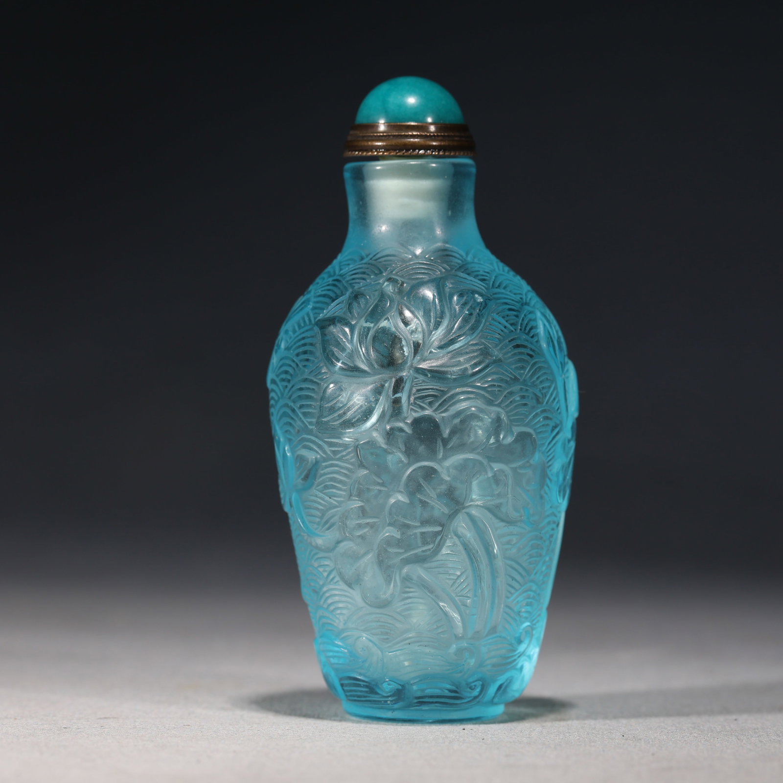 An Exquisite Sky-blue Glass Lotus Pattern Snuff Bottle (1 of 5)