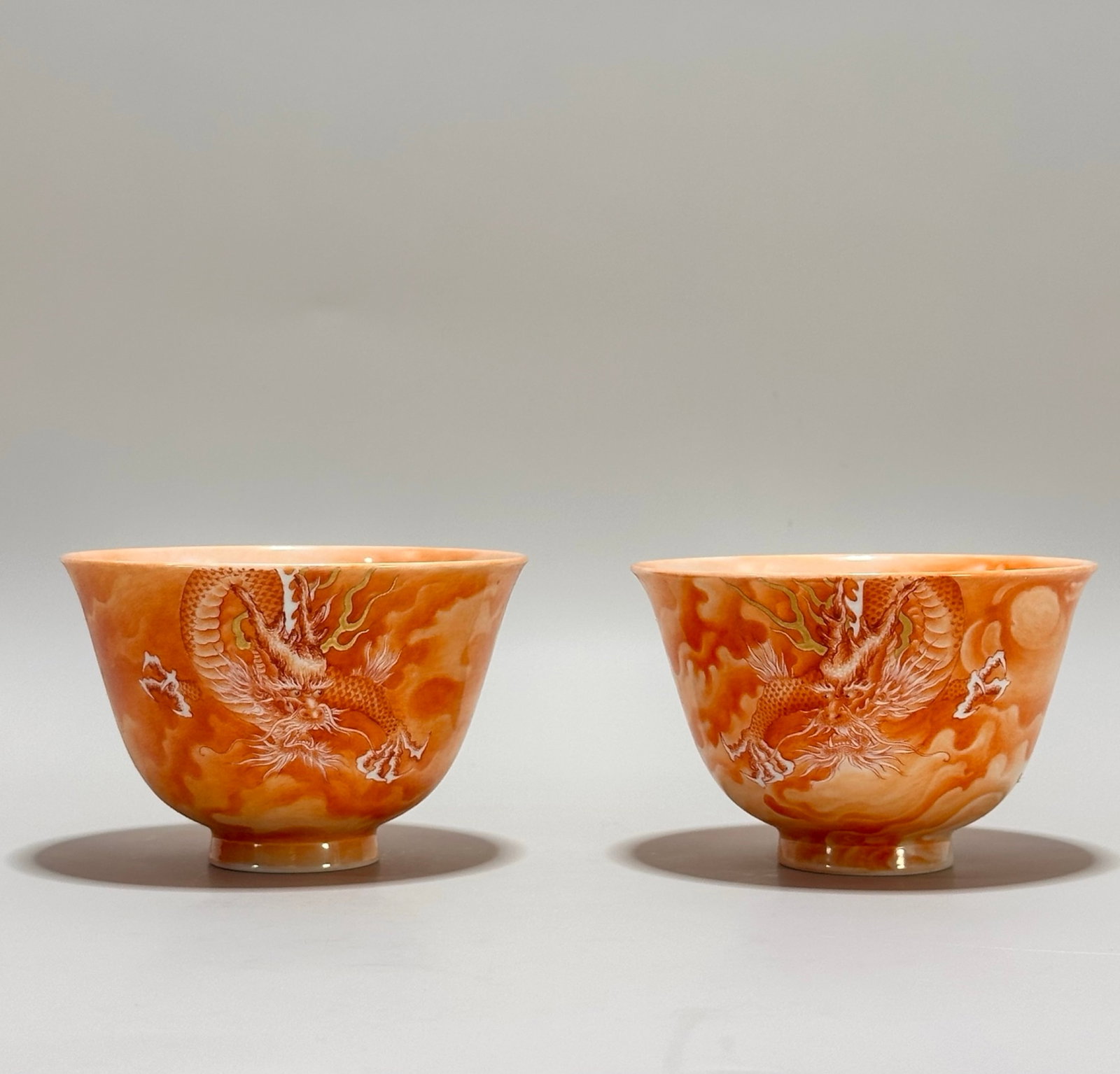 A Pair of Exquisite Iron-Red Painted Gold Auspicious Cloud and Dragon Pattern Cups: A Pair of Exquisite Iron-Red Painted Gold Auspicious Cloud and Dragon Pattern Cups,Qing Dynasty,China,Qianlong Six-character Mark,Size:2.5inx3.9in 一对矾红描金Ķ