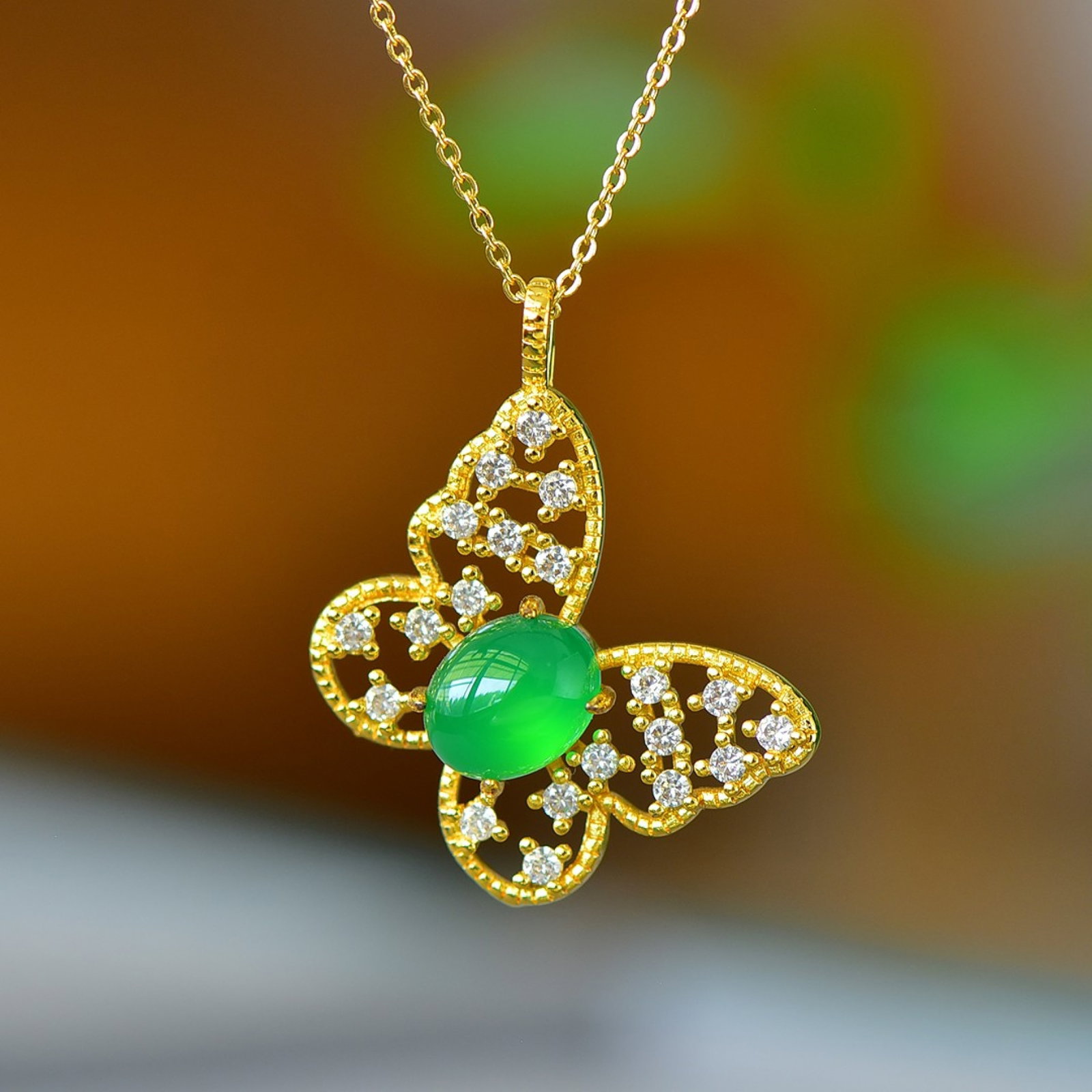 An Exquisite Butterfly Pendant,Inlaid Diamond: An Exquisite Butterfly Pendant Size:8mmx10mm 蝴蝶吊坠