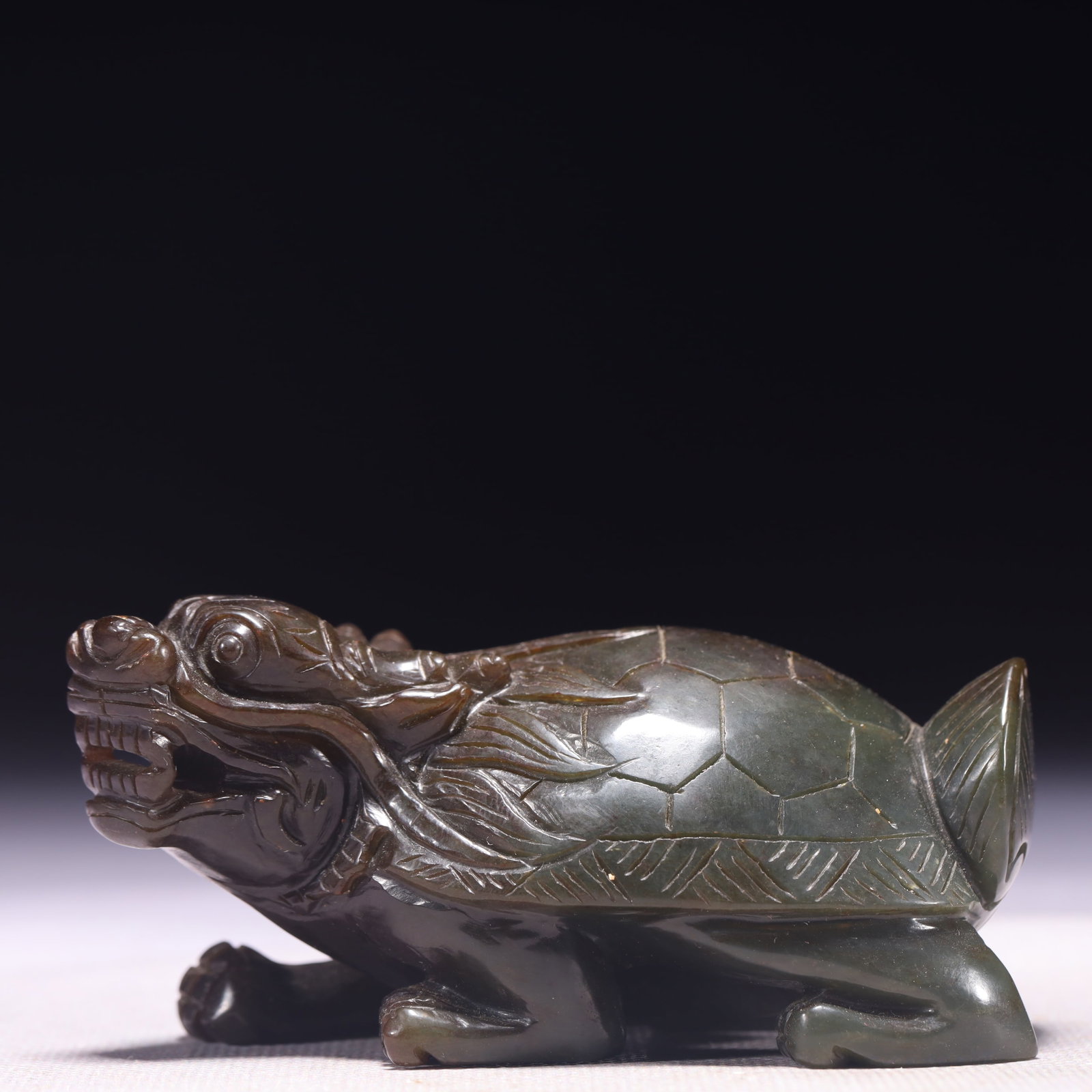 An Exquisite Green Jade Auspicious Beast Ornament: An Exquisite Green Jade Auspicious Beast Ornament,Qing Dynasty,China,Size:3.7inx1.8inx2in,Weight:287g 青玉瑞兽摆件,中国清代