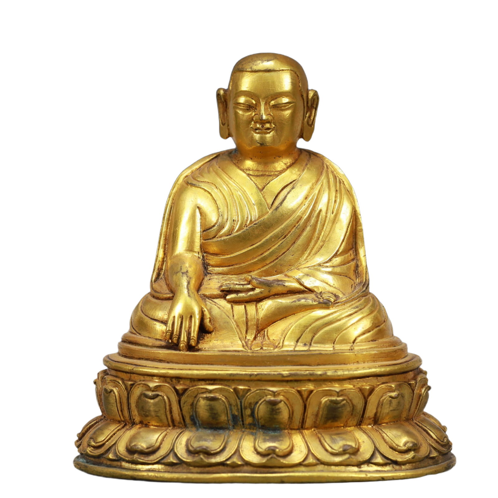 An Excellent Gilt-Bronze Figure Of Brog.Mi: An Excellent Gilt-Bronze Figure Of Brog.Mi. Seated,body rendered clad in long,flowing robes,the voluminous drapery elegantly cascading in folds. Chinese Qing Dynasty. Size:4.9inx3.7inx5.3in. Weight:13
