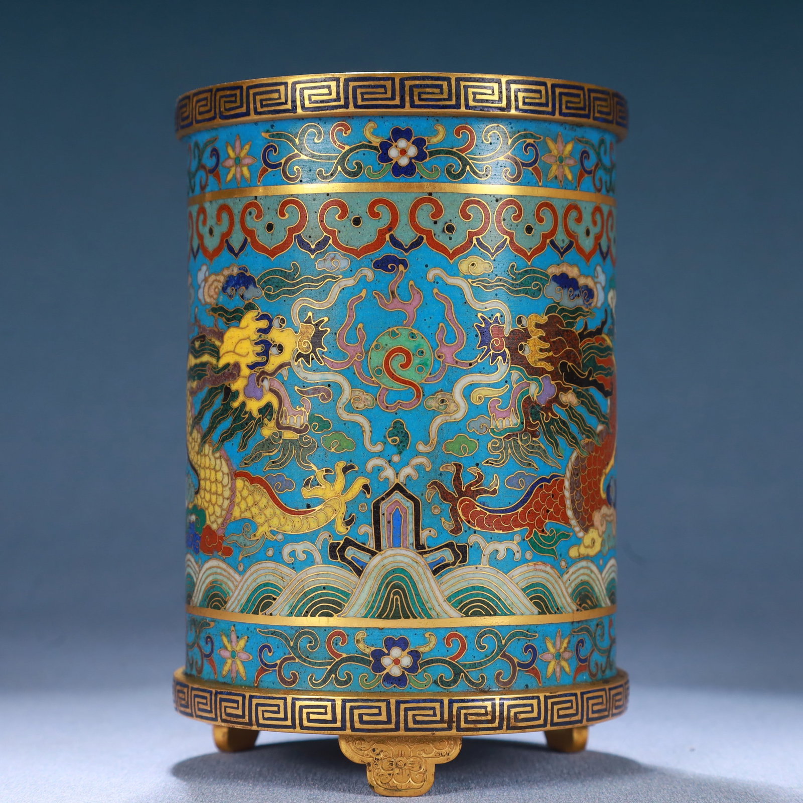 An Exquisite Cloisonne Seawater,Auspicious Cloud and Dragon Pattern Tripod Brush Pot: An Exquisite Cloisonne Seawater,Auspicious Cloud and Dragon Pattern Tripod Brush Pot,Qing Dynasty, China,Qianlong Four-character Mark,Size:3.5inx5.3in,Weight:650g 景泰蓝海ĕ