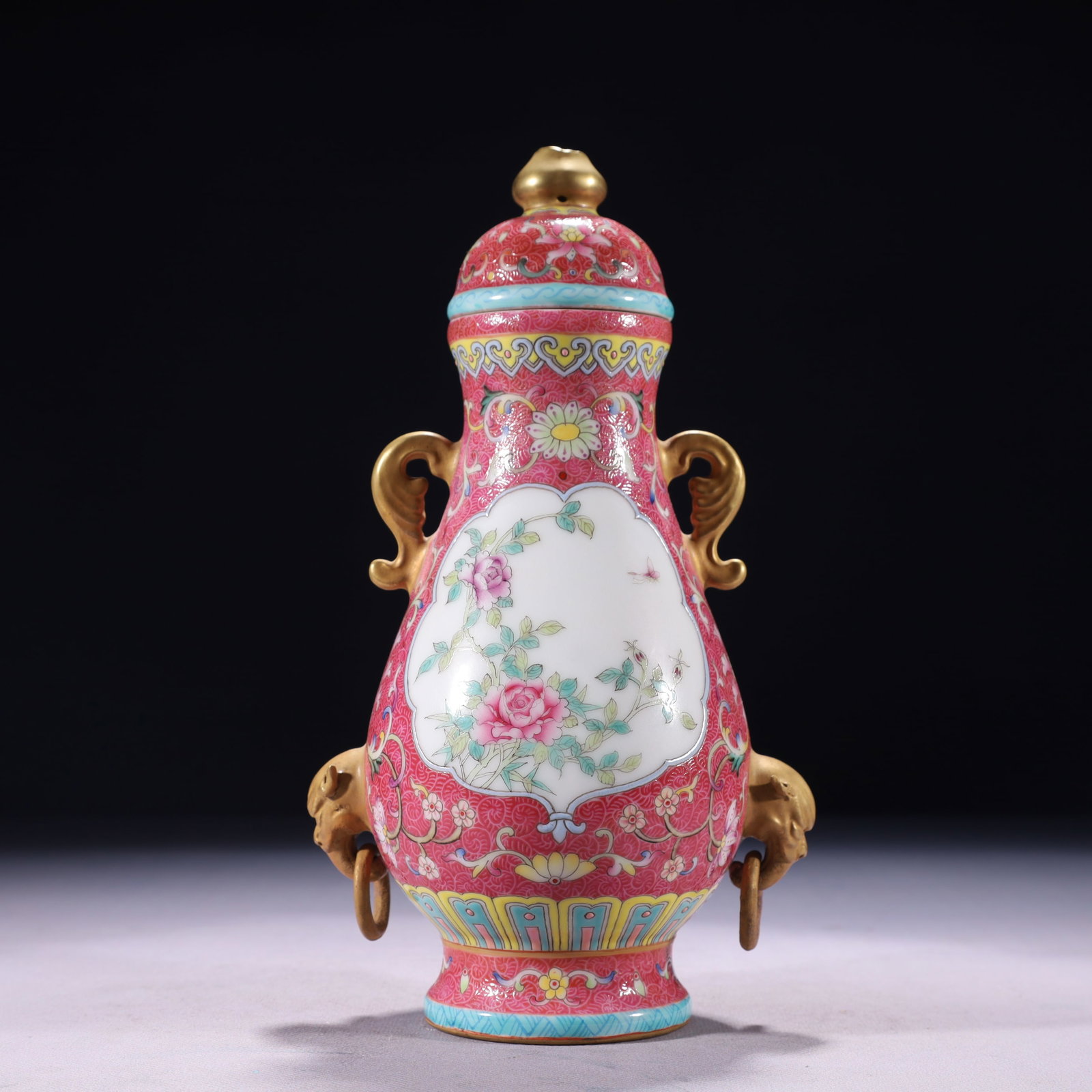 An Exquisite Famille-Rose Painted Gold Lotus Pattern Double-Ears Bottle: An Exquisite Famille-Rose Painted Gold Lotus Pattern Double-Ears Bottle,Qing Dynasty,China,Qianlong Six-character Mark,Size:5.5inx3.9inx9.8in,Weight:600g