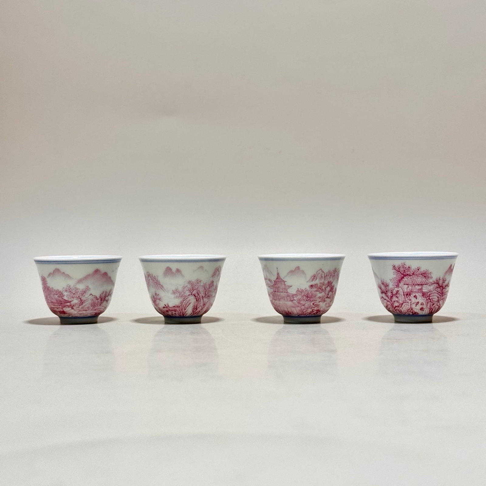 A Set of Fine Ruby Red-Glazed Landscape Pattern Cups: A Set of Fine Ruby Red-Glazed Landscape Pattern Cups,Qing Dynasty,China,Yongzheng Six-character Mark,Size:1.3inx1.9in 一套胭脂红山水纹杯子,&