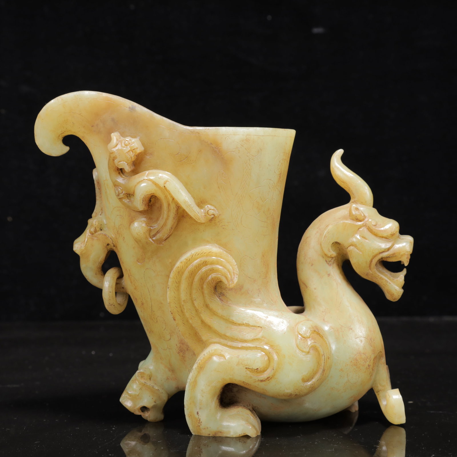 An Exquisite White Jade Auspicious Beast Cup: An Exquisite White Jade Auspicious Beast Cup,Qing Dynasty,China,Size:6.3inx2.8inx5.9in,Weight:958g 白玉瑞兽杯,中国清代