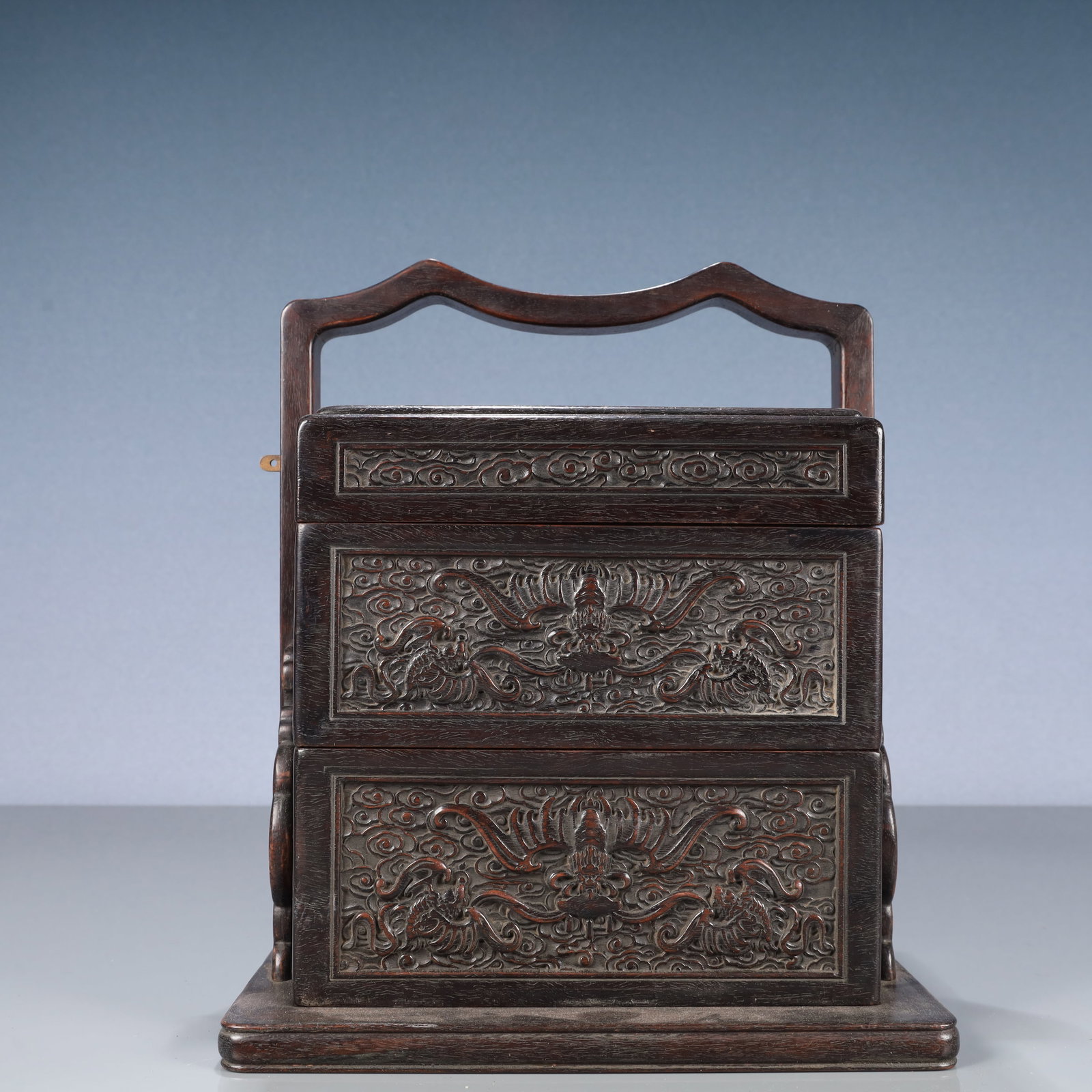 An Exquisite Zitanwood Auspicious Cloud and Bats Pattern Tiered box: An Exquisite Zitanwood Auspicious Cloud and Bats Pattern Tiered box,Qing Dynasty, China,Size:8.7inx10.6in,Weight:1850g 紫檀木祥云蝙蝠纹提盒,