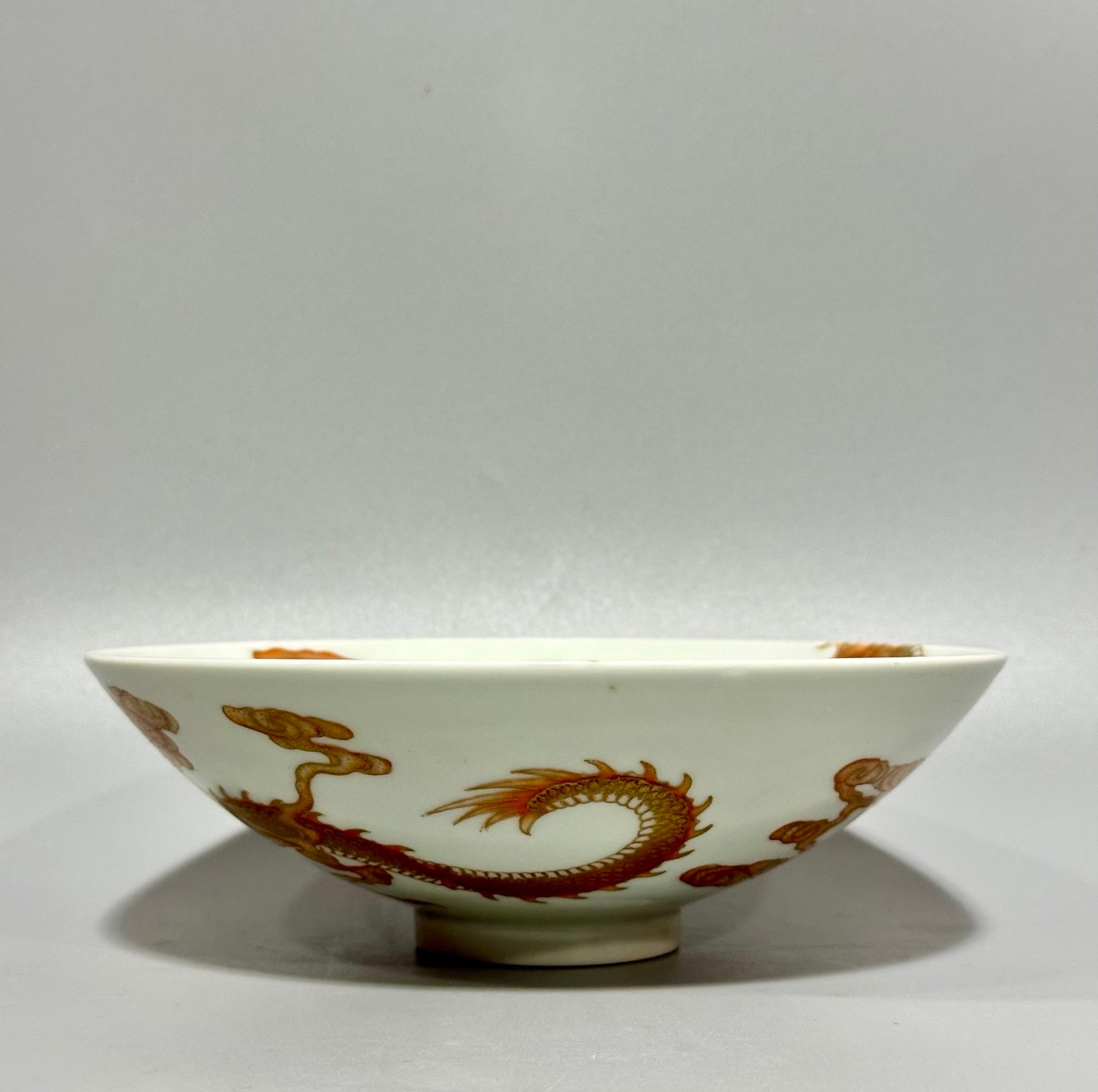 An Exquisite Iron-Red Painted Gold Auspicious Cloud and Dragon Pattern Bowl (1 of 9)