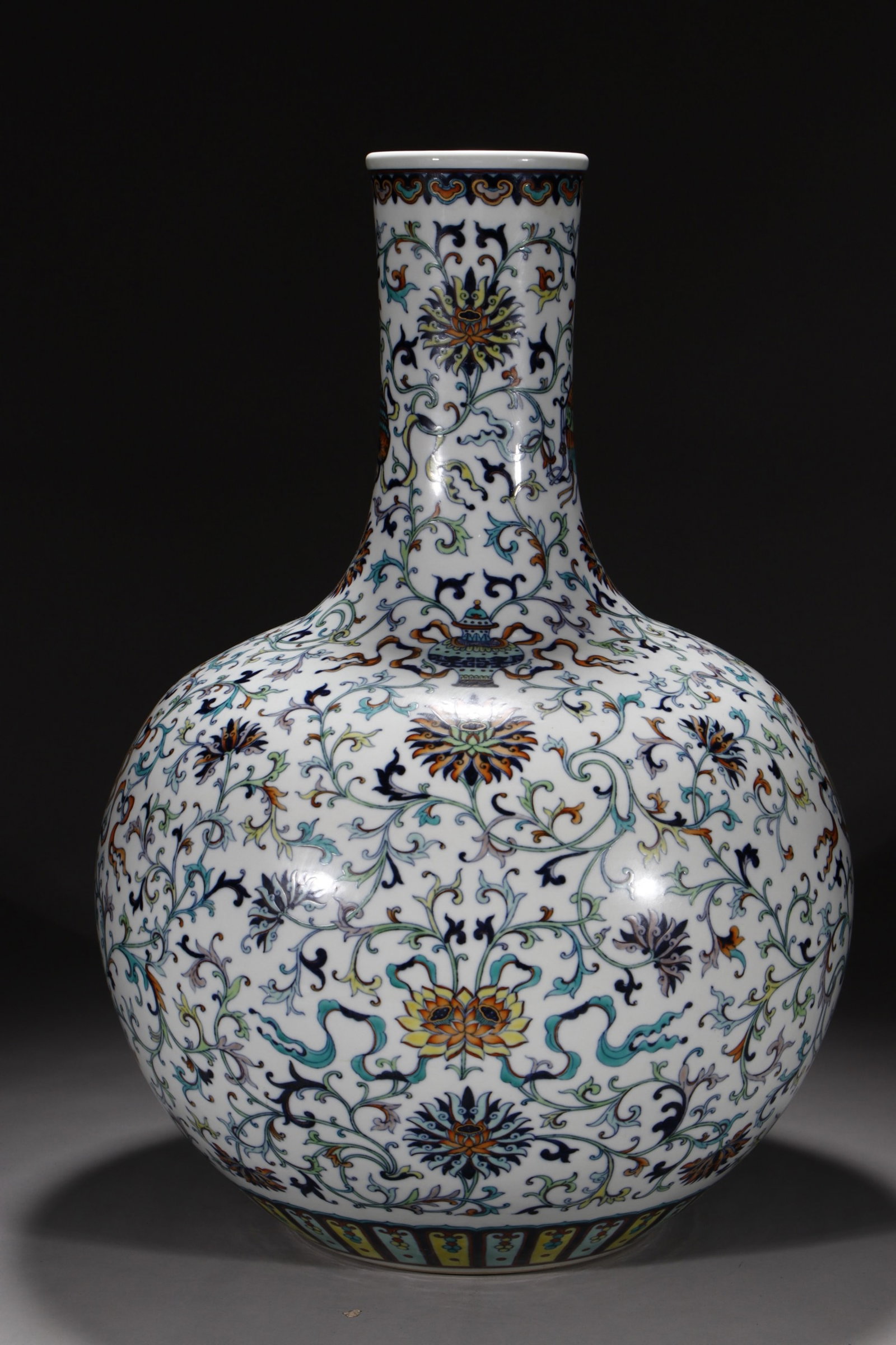 A Huge Doucai Lotus and Eight Treasures Pattern Vase: A Huge Doucai Lotus and Eight Treasures Pattern Vase,Qing Dynasty,China,Qianlong Six-character Mark,Size:21in 斗彩缠枝莲八宝纹瓶,中国&