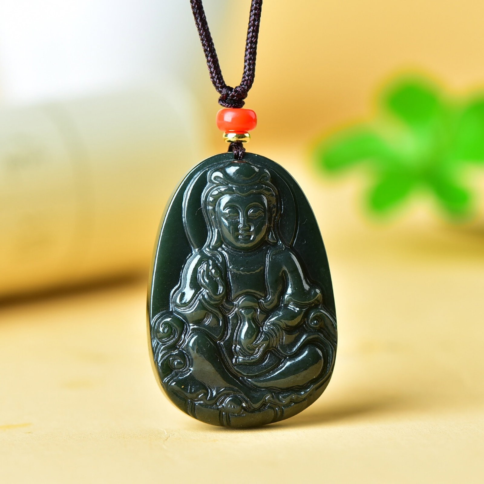 An Exquisite Jasper Statue of Avalokitesvara Pendant: An Exquisite Jasper Statue of Avalokitesvara Pendant,Size:47mmx34mm 碧玉观音挂件