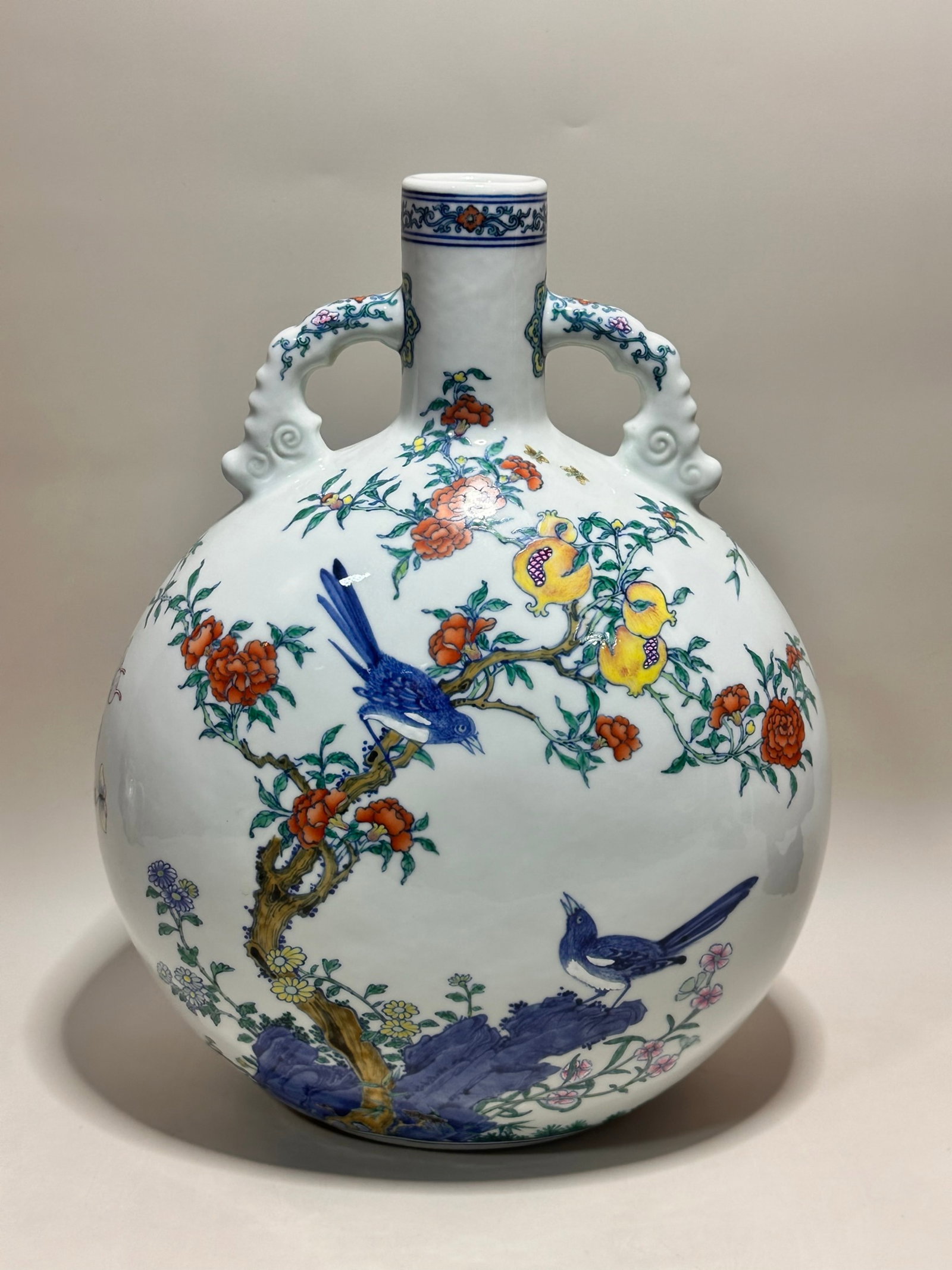 A Rare Blue and White Doucai Flower and Fruit Pattern Double-Ears Vase: A Rare Blue and White Doucai Flower and Fruit Pattern Double-Ears Vase,Qing Dynasty,China,Yongzheng Six-character Mark,Size:14.5inx11.4in 青花斗彩花果纹ࡡ