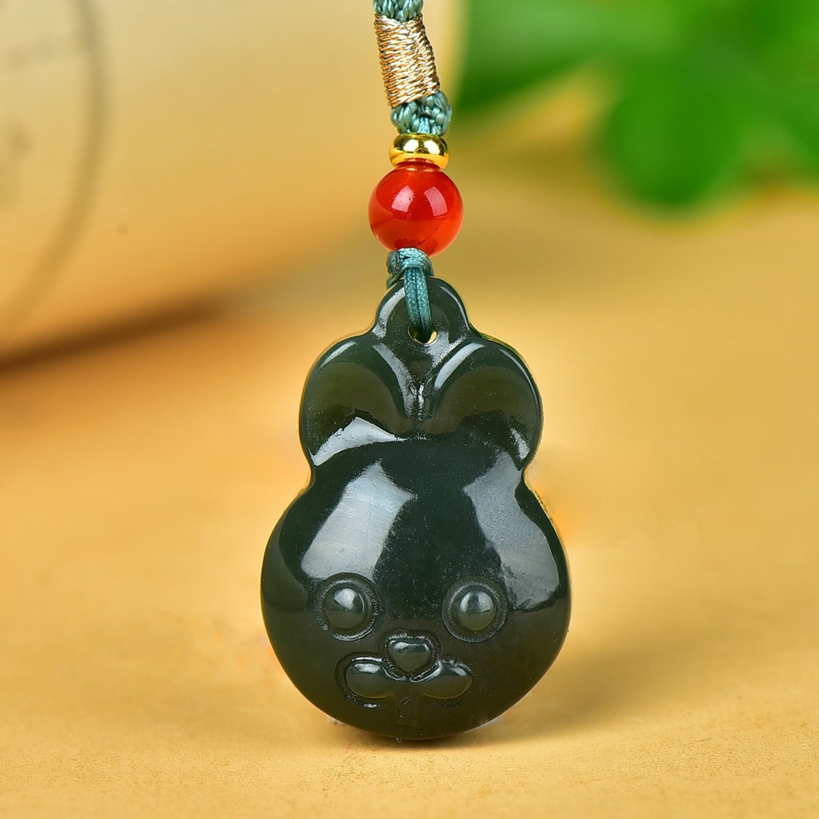 An Exquisite Jasper Rabbit Pattern Pendant: An Exquisite Jasper Rabbit Pattern Pendant,Size:21mmx30mm 碧玉兔纹挂件