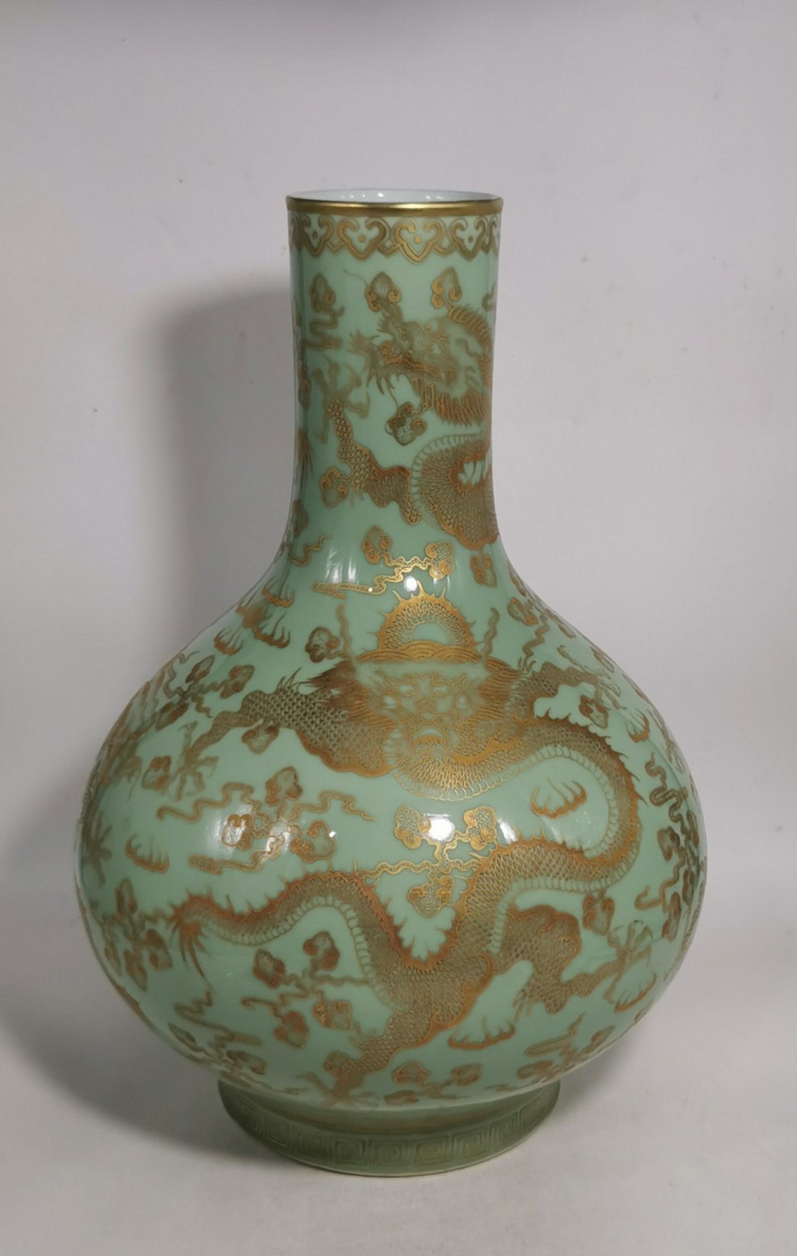 A Huge Celadon Glazed Painted Gold Auspicious Cloud and Dragon Pattern Vase: A Huge Celadon Glazed Painted Gold Auspicious Cloud and Dragon Pattern Vase,Qing Dynasty,China,Guangxu Six-character Mark,Size:16.1inx3.5in 青釉描金祥云龙 