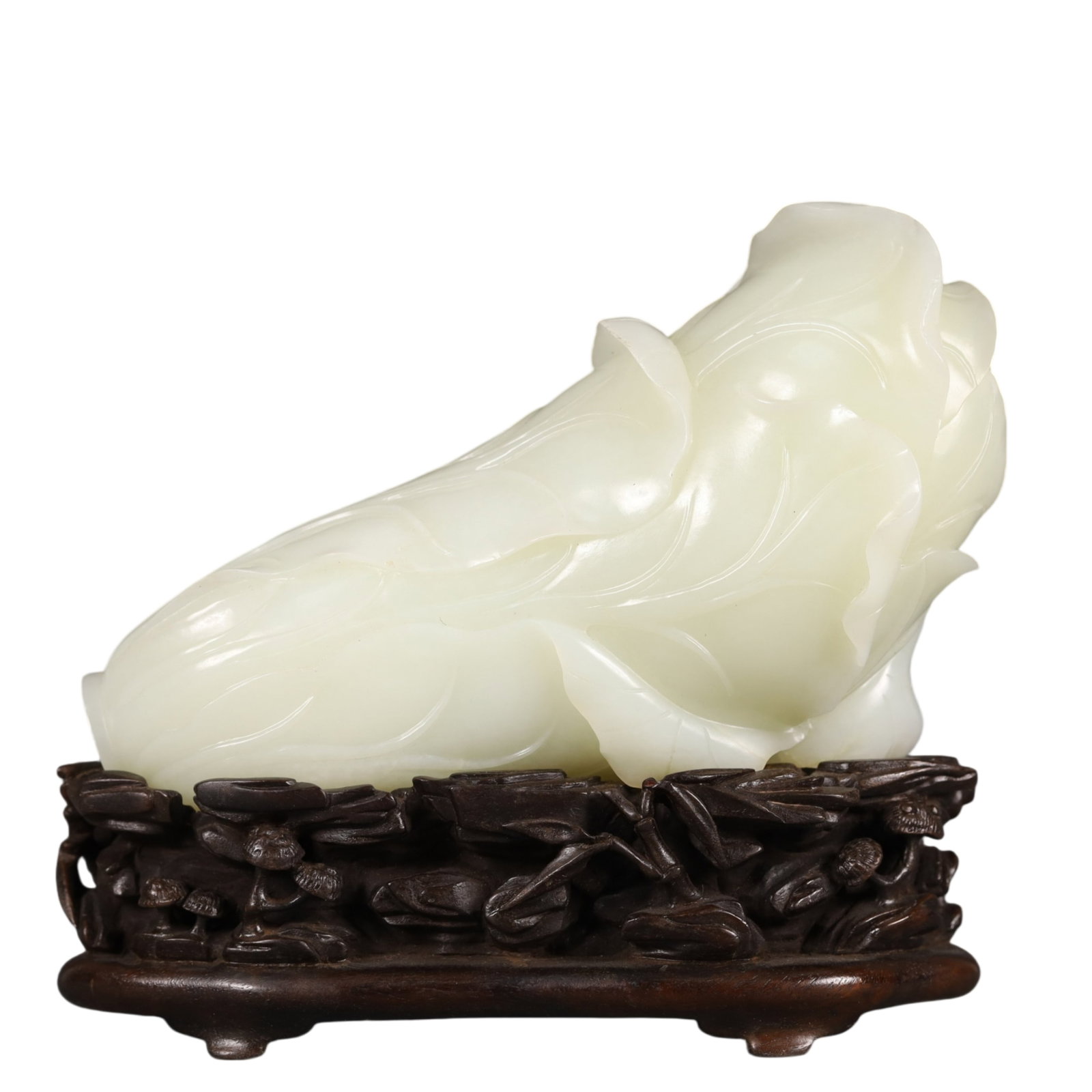 A Precious White Jade Cabbage Ornament: A Precious White Jade Cabbage Ornament,Qing Dynasty, China,Size:5.9inx2inx5.5in Weight:1200g 白玉白菜摆件,中国清代