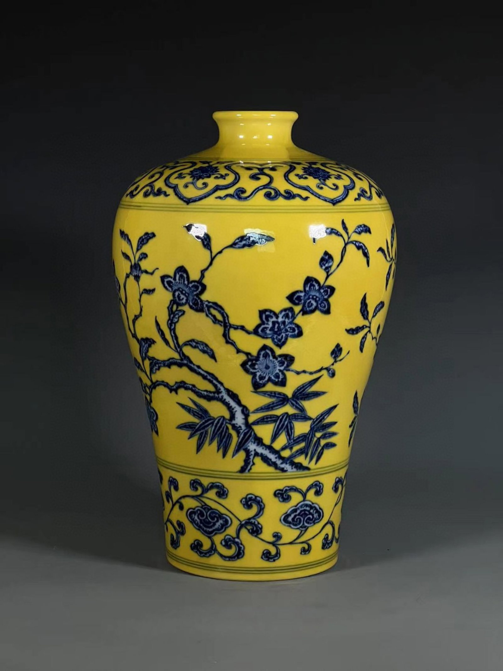 A Rare Yellow Ground Blue and White Flower Pattern Vase: A Rare Yellow Ground Blue and White Flower Pattern Vase,Qing Dynasty,China,Size:14.6inx5.6in 黄地青花花卉纹瓶,中国清代