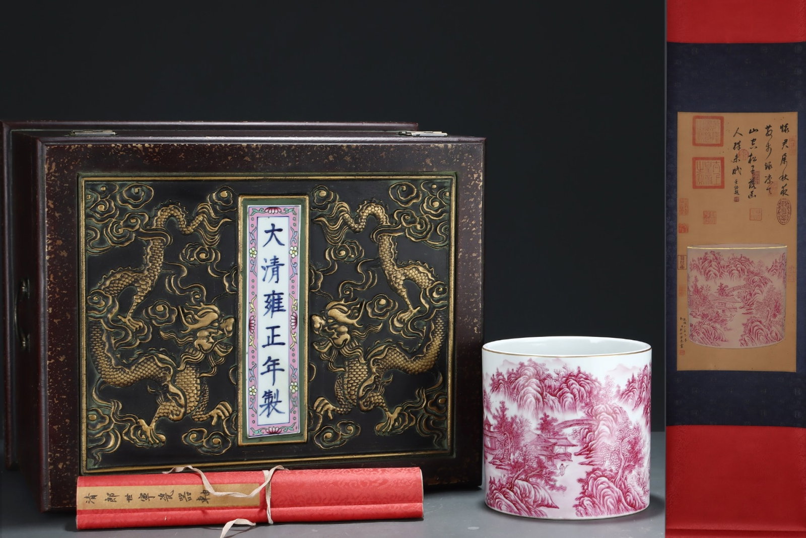 An Exquisite Iron-Red Painted Gold Landscape Pattern Brush Pot,with Chinese Vertical Scroll Ink: An Exquisite Iron-Red Painted Gold Landscape Pattern Brush Pot,with Chinese Vertical Scroll Ink Painting on Silk,Qing Dynasty,China,Yongzheng Six-character Mark,Size:(Silk)25.4inx11.8in,(Porcelain)6.9