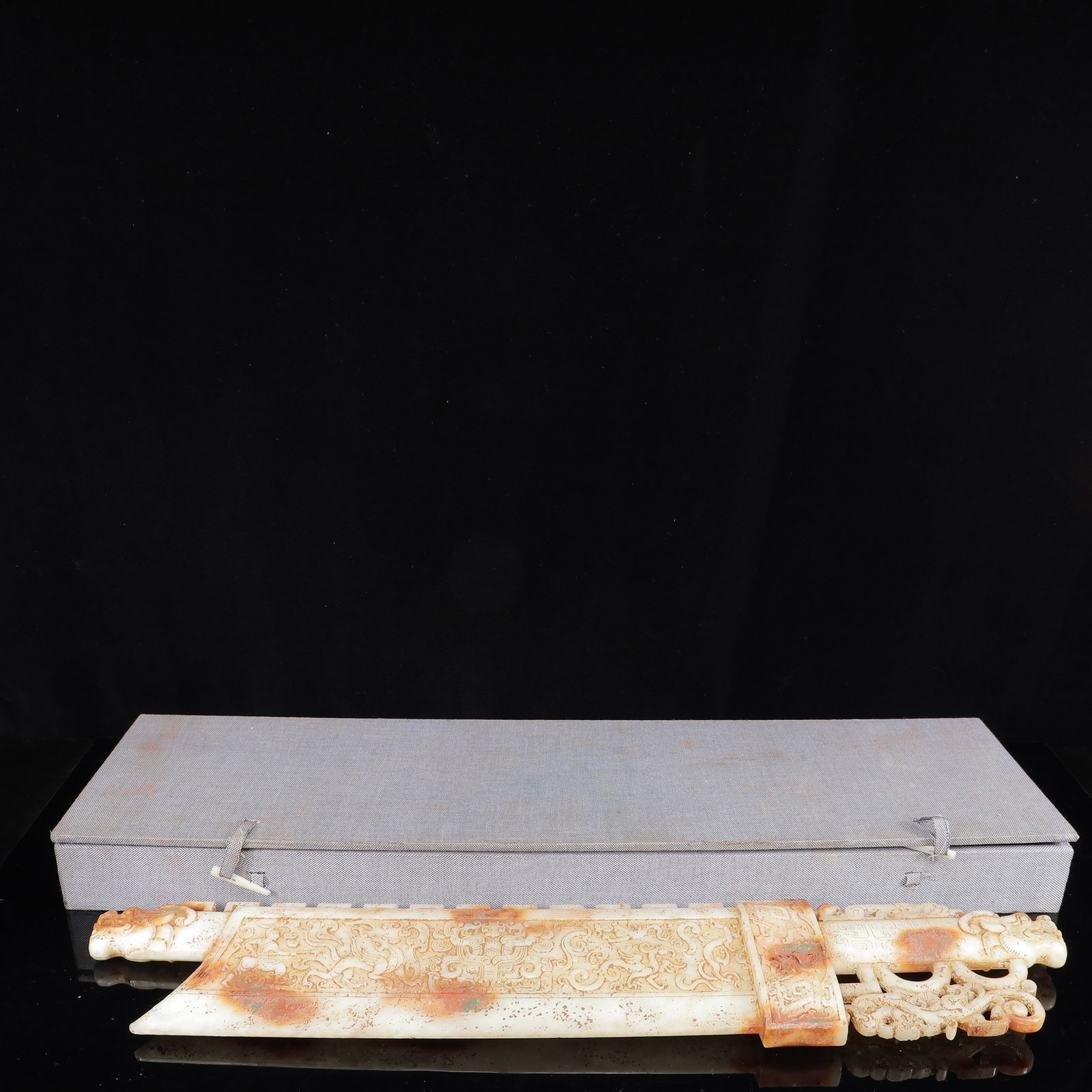 An Exquisite White Jade Chi-Dragon Pattern Sword: An Exquisite White Jade Chi-Dragon Pattern Sword,Qing Dynasty,China,Size:22.8inx0.8inx4.3in,Weight:2312g 白玉螭龙纹刀,中国清代