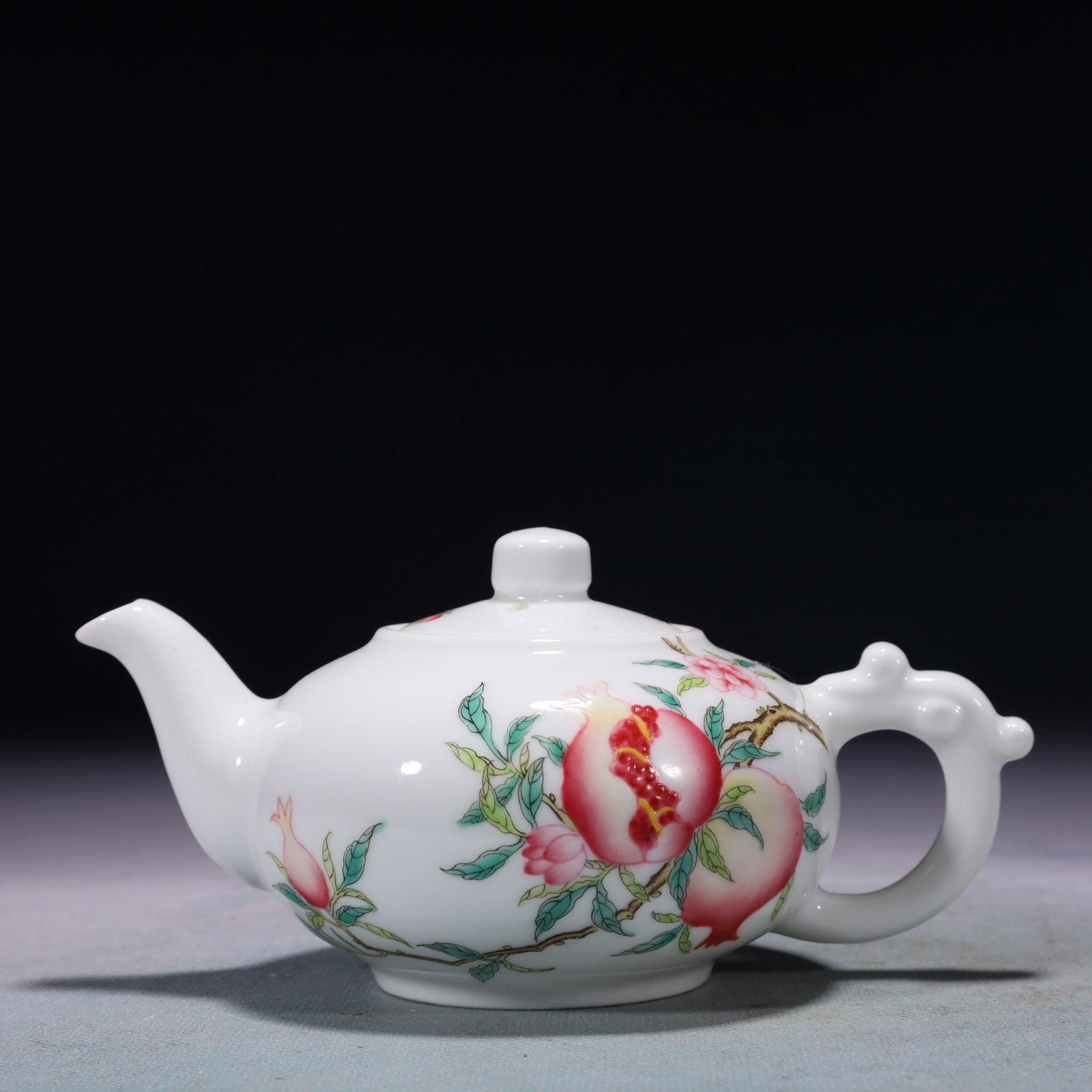 An Exquisite Famille-Rose Flower and Fruit Pattern Teapot,with poem: An Exquisite Famille-Rose Flower and Fruit Pattern Teapot,with poem,Qing Dynasty,China,Yongzheng Four-character Mark,Size:6.3inx3.9inx3in,Weight:150g 粉彩花果纹茶&#