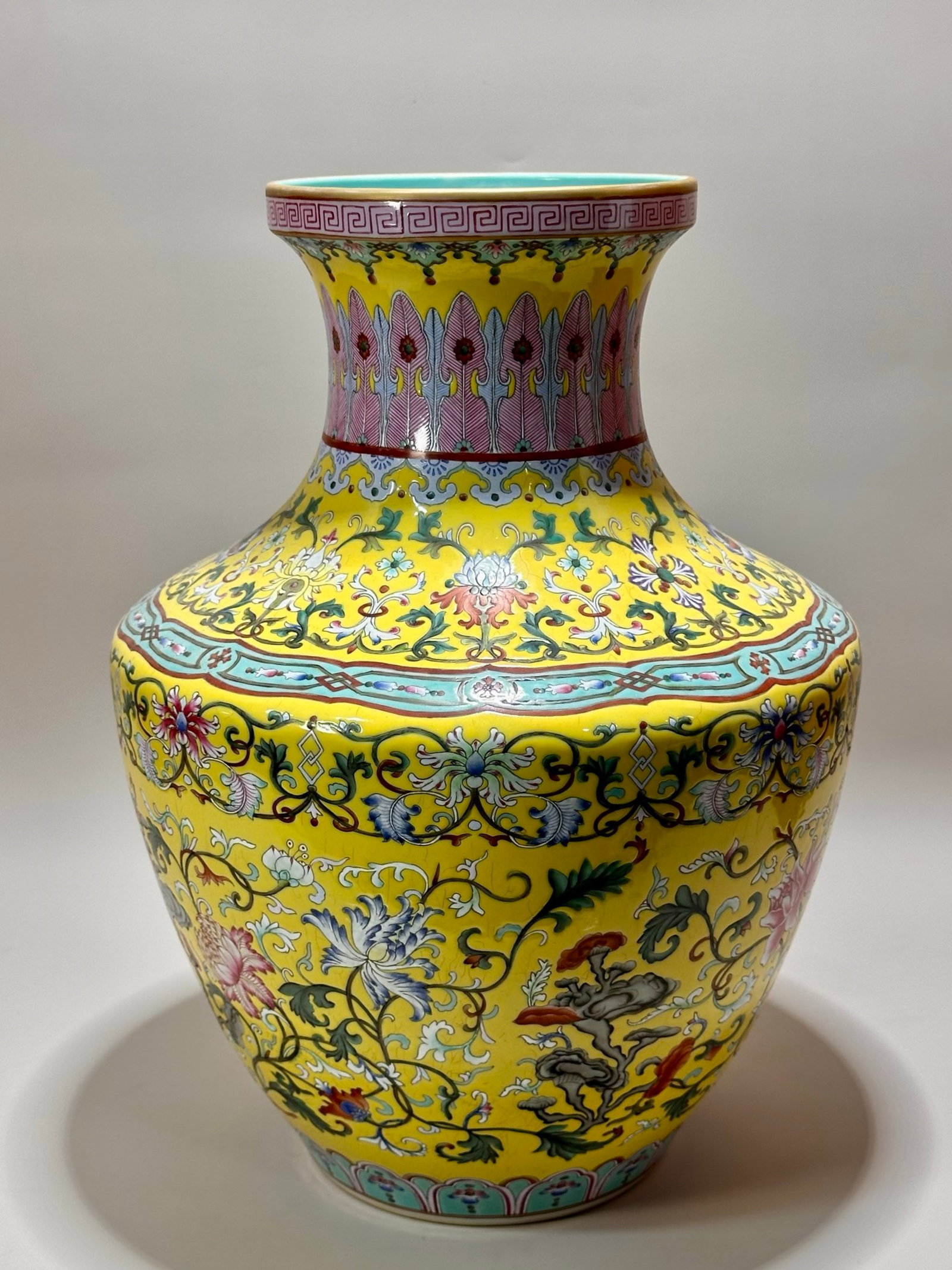 A Rare Yellow Ground Enamel Lotus Pattern Vase: A Rare Yellow Ground Enamel Lotus Pattern Vase,Qing Dynasty,China,Qianlong Six-character Mark,Size:15.2inx11.4in 黄地珐琅彩缠枝莲纹瓶,ߑ