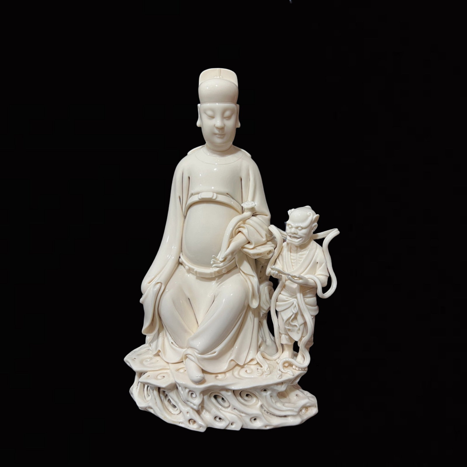 A Solemn Blance-De-Chine Statue of Figure: A Solemn Blance-De-Chine Statue of Figure,Ming Dynasty,China,He Chaozong Mark,Size:16.9in 德化瓷人物像,中国明代,何朝宗