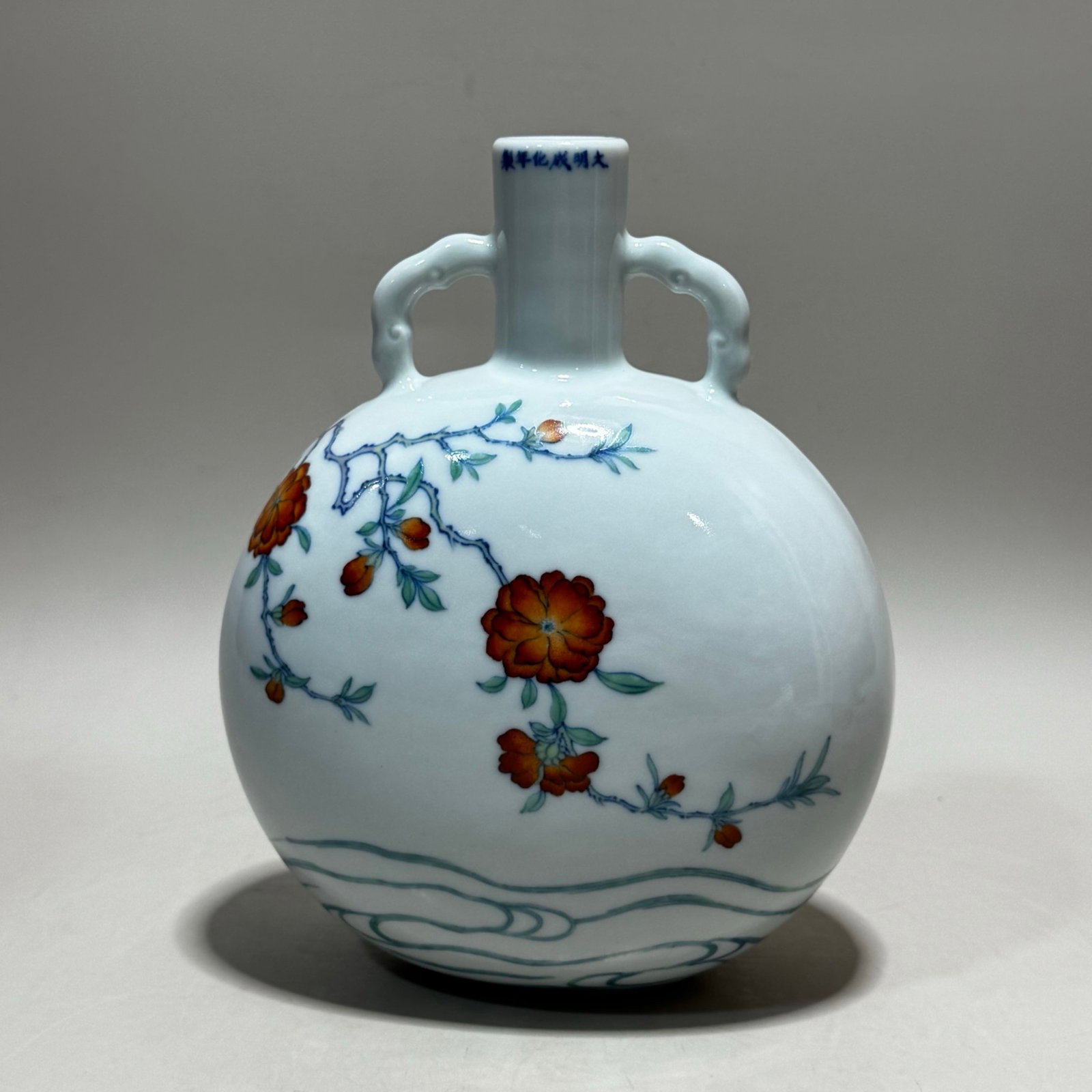 An Exquisite Doucai Flower Pattern Double-Ears Vase: An Exquisite Doucai Flower Pattern Double-Ears Vase,Ming Dynasty,China,Chenghua Six-character Mark,Size:7.4inx5.9in 斗彩花卉纹双耳瓶,中国