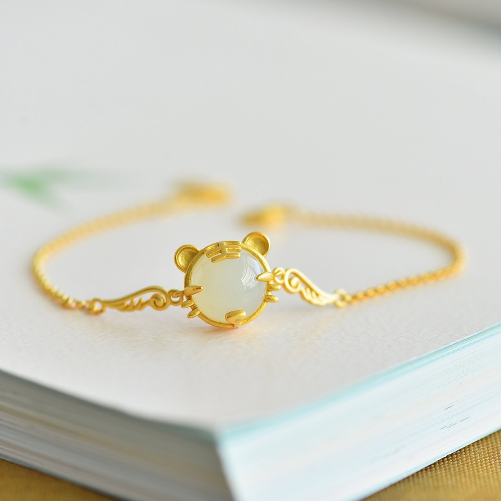 An Exquisite Sterling Silver-Gold Plated Inlaid White Jade Bracelets: An Exquisite Sterling Silver-Gold Plated Inlaid White Jade Bracelets 纯银镀金镶白玉手链