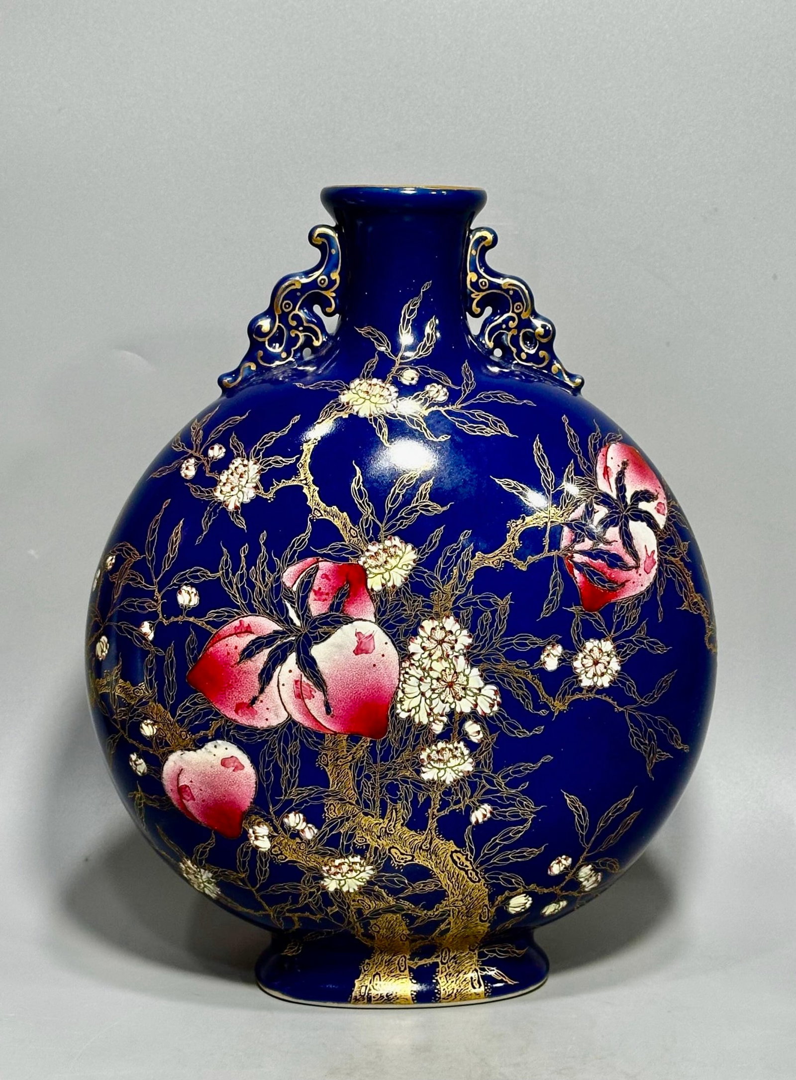A Rare Ji Blue Glazed Painted Gold Bats and Peach Pattern Double-Ears Vase: A Rare Ji Blue Glazed Painted Gold Bats and Peach Pattern Double-Ears Vase,Qing Dynasty,China,Qianlong Six-character Mark,Size:12.4inx10in 霁蓝釉描金福寿ń