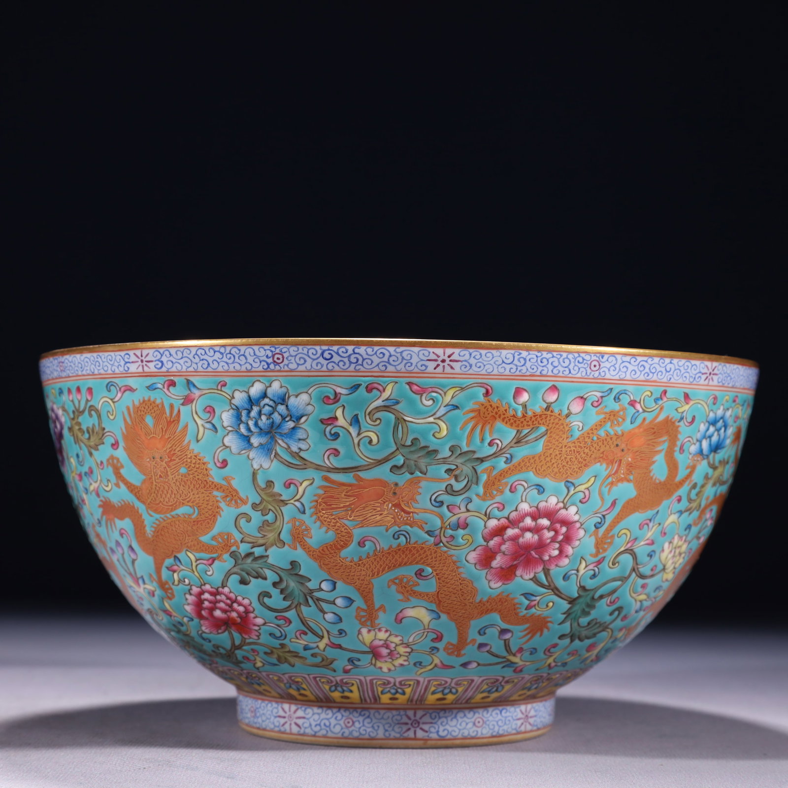 An Exquisite Turquoise Glazed Famille-Rose Painted Gold Flower and Dragon Pattern Bowl: An Exquisite Turquoise Glazed Famille-Rose Painted Gold Flower and Dragon Pattern Bowl,Qing Dynasty,China,Qianlong Six-character Mark,Size:8.5inx4.3in,Weight:850g
