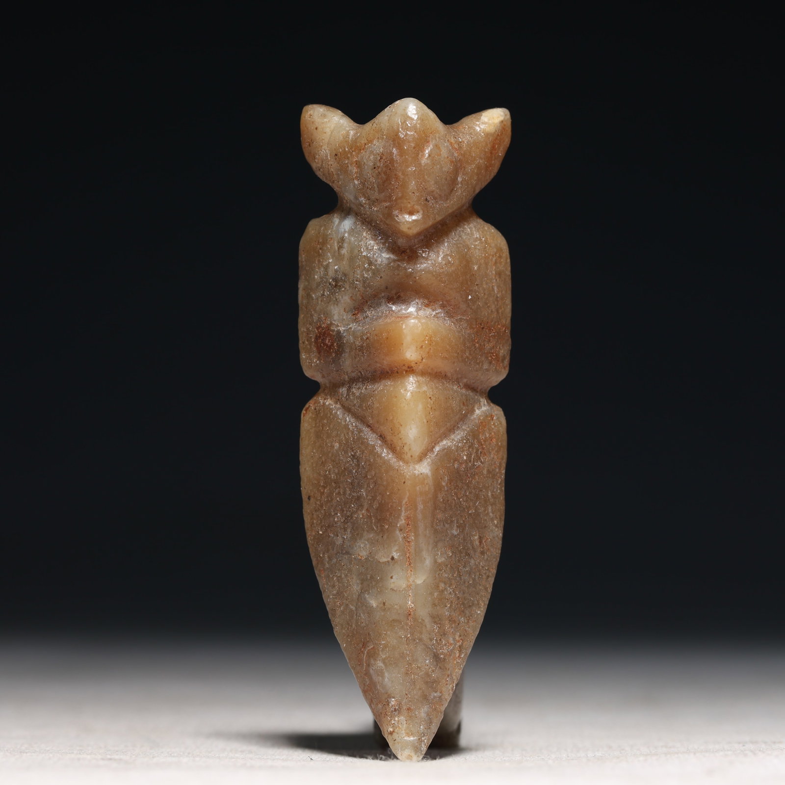 An Archaic Hongshan Culture Figure Pendant: An Archaic Hongshan Culture Figure Pendant,Ancient Time, China,Size:1.1inx0.7inx3.3in Weight:58.5g 红山文化人形挂件,新石器时