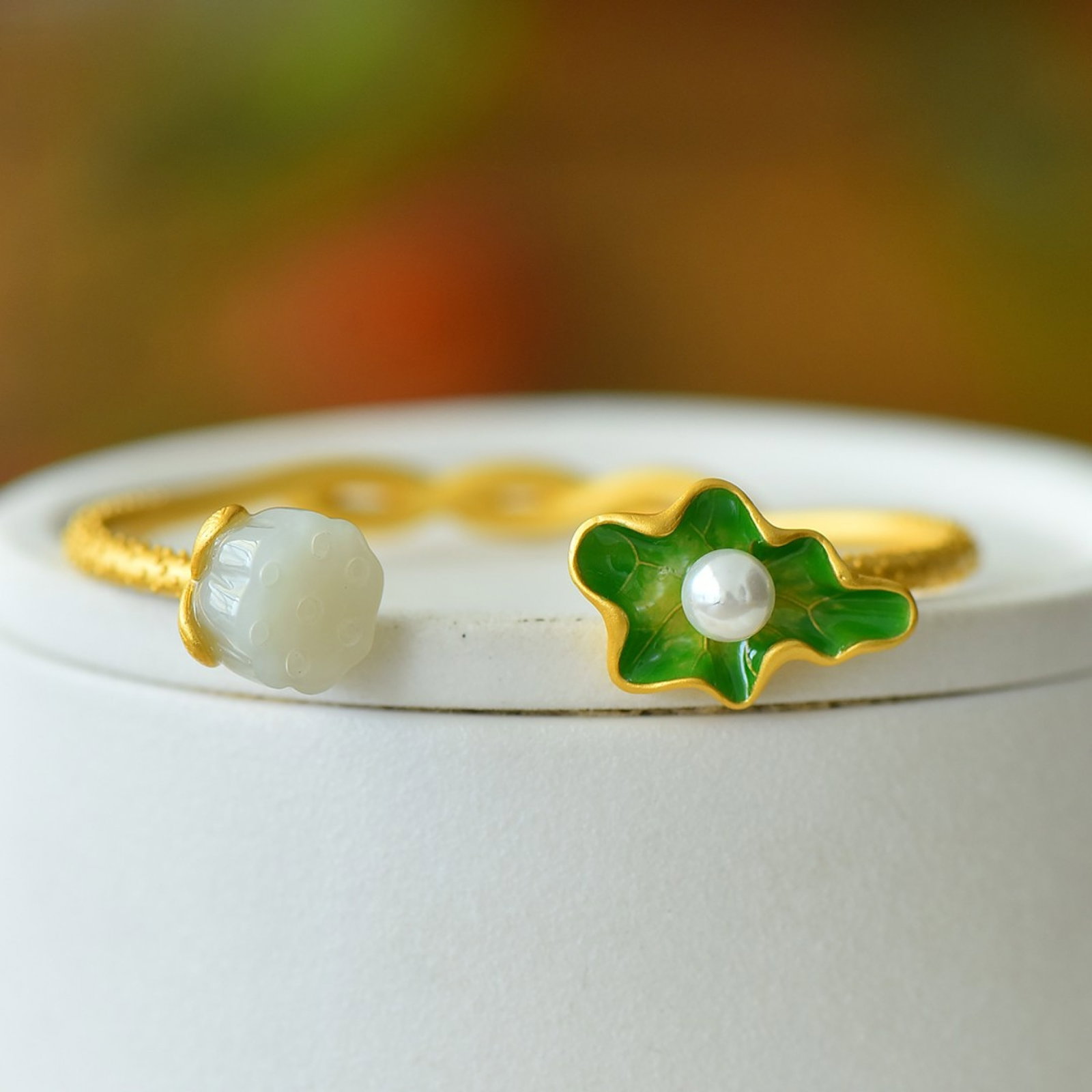 An Exquisite Sterling Silver-Gold Plated Inlaid White Jade Bracelet: An Exquisite Sterling Silver-Gold Plated Inlaid White Jade Bracelet 纯银镀金镶白玉手镯