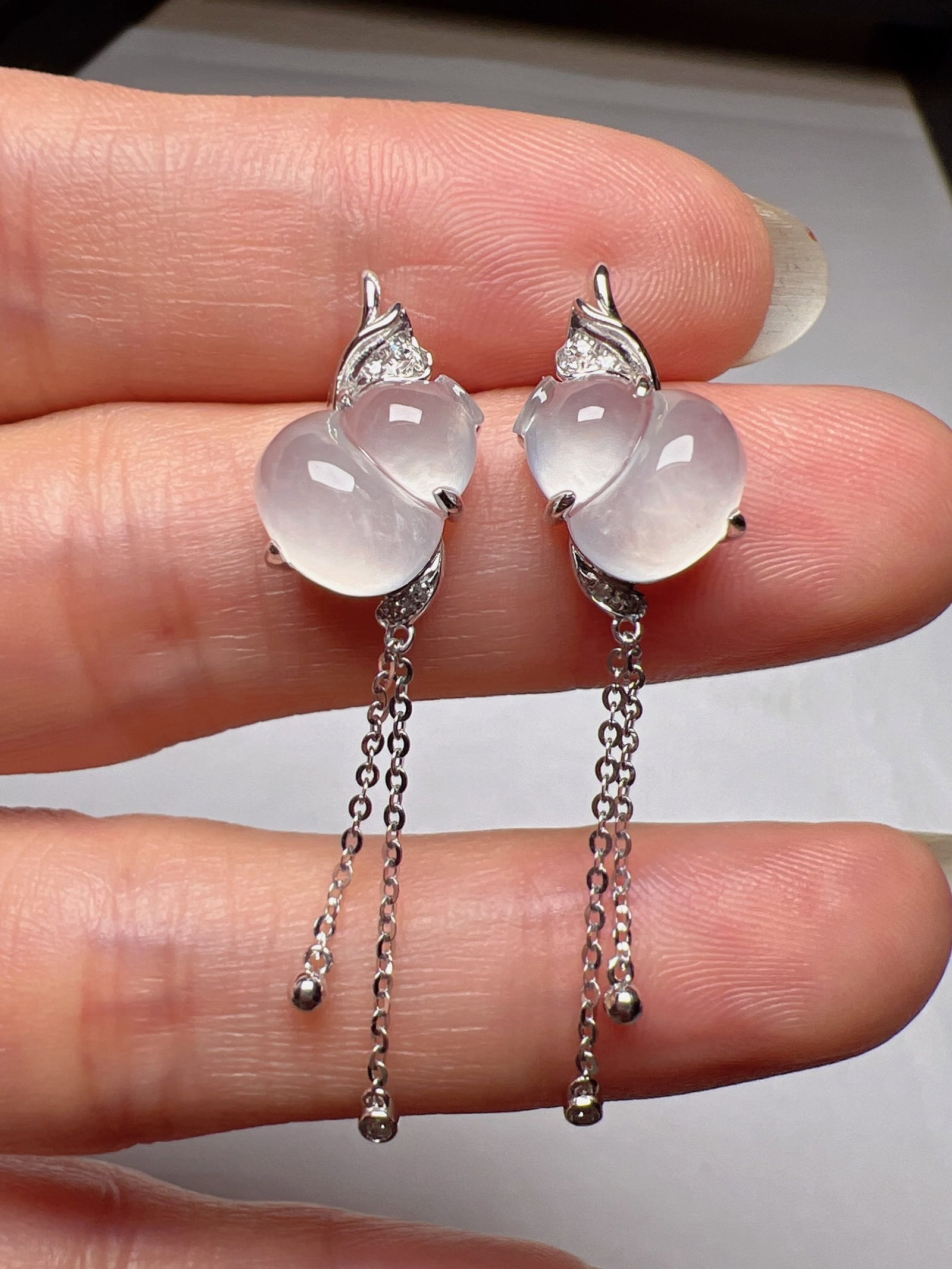 A Pair of Exquisite 18k Gold Diamond Inlaid Jadeite Earrings: A Pair of Exquisite 18k Gold Diamond Inlaid Jadeite Earrings,Size(Loose Stone):0.4inx0.3in 一对18k金钻镶嵌翡翠耳环