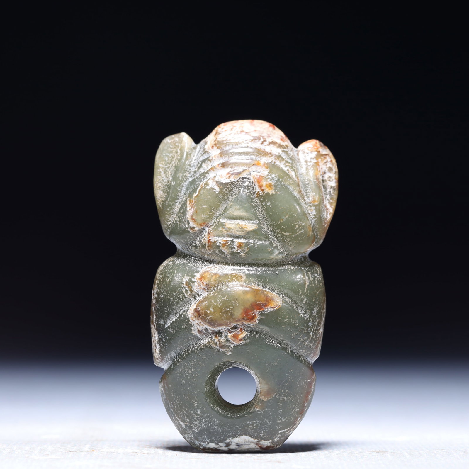 An Archaic Hongshan Culture Greenish Jade Beast-Face Pattern Pendant: An Archaic Hongshan Culture Greenish Jade Beast-Face Pattern Pendant,Ancient Time,China,Size:1.3inx0.4inx2.4in,Weight:42g 红山文化青白玉兽面ಬ
