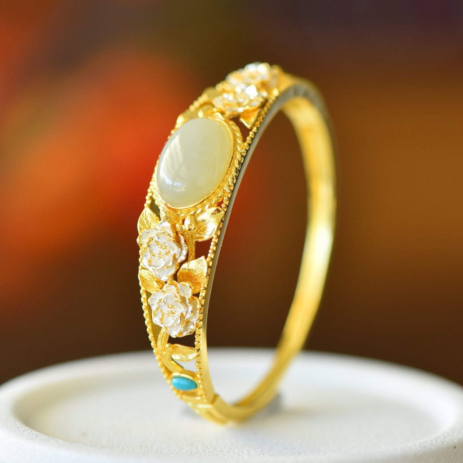 An Exquisite Sterling Silver-Gold Plated Inlaid White Jade Enamel Bracelet: An Exquisite Sterling Silver-Gold Plated Inlaid White Jade Enamel Bracelet,Size:0.5inx0.7in 纯银镀金镶白玉珐琅手镯