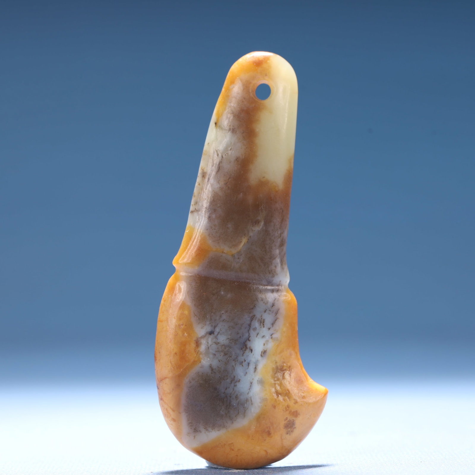 An Archaic Hongshan Culture Yellow Jade Pendant: An Archaic Hongshan Culture Yellow Jade Pendant,Ancient Time,China,Size:1.5inx0.4inx3.9in,Weight:54.2g 红山文化黄玉挂件,中国新石
