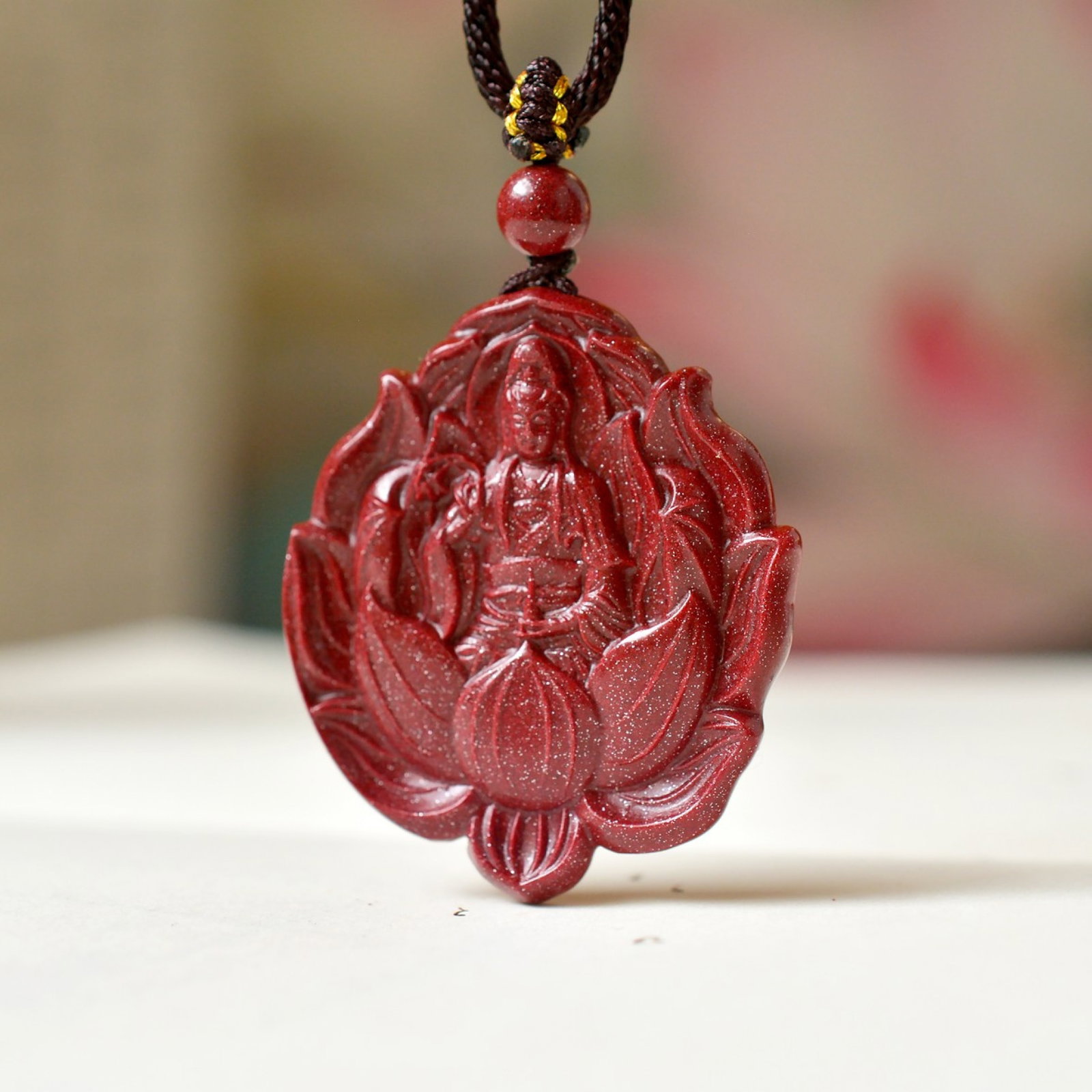 An Exquisite Cinnabar Pendant with Statue of Avalokitesvara: An Exquisite Cinnabar Pendant with Statue of Avalokitesvara,Size:1.3inx1.5in,Weight:8.5g 朱砂挂件带观音像