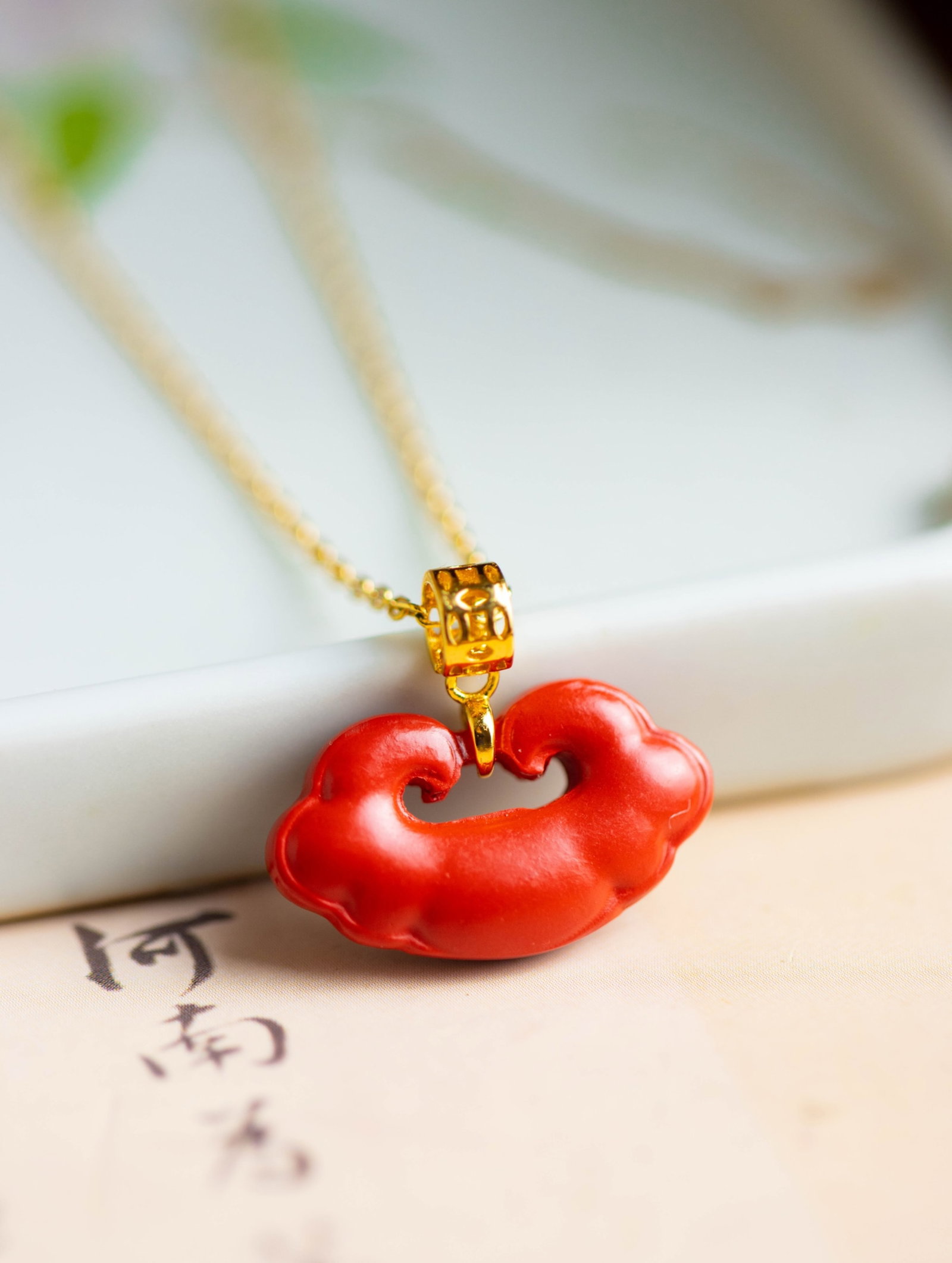 An Exquisite Sterling Silver-Gold Plated Inlaid Cinnabar Pendant: An Exquisite Sterling Silver-Gold Plated Inlaid Cinnabar Pendant 纯银镀金镶朱砂吊坠