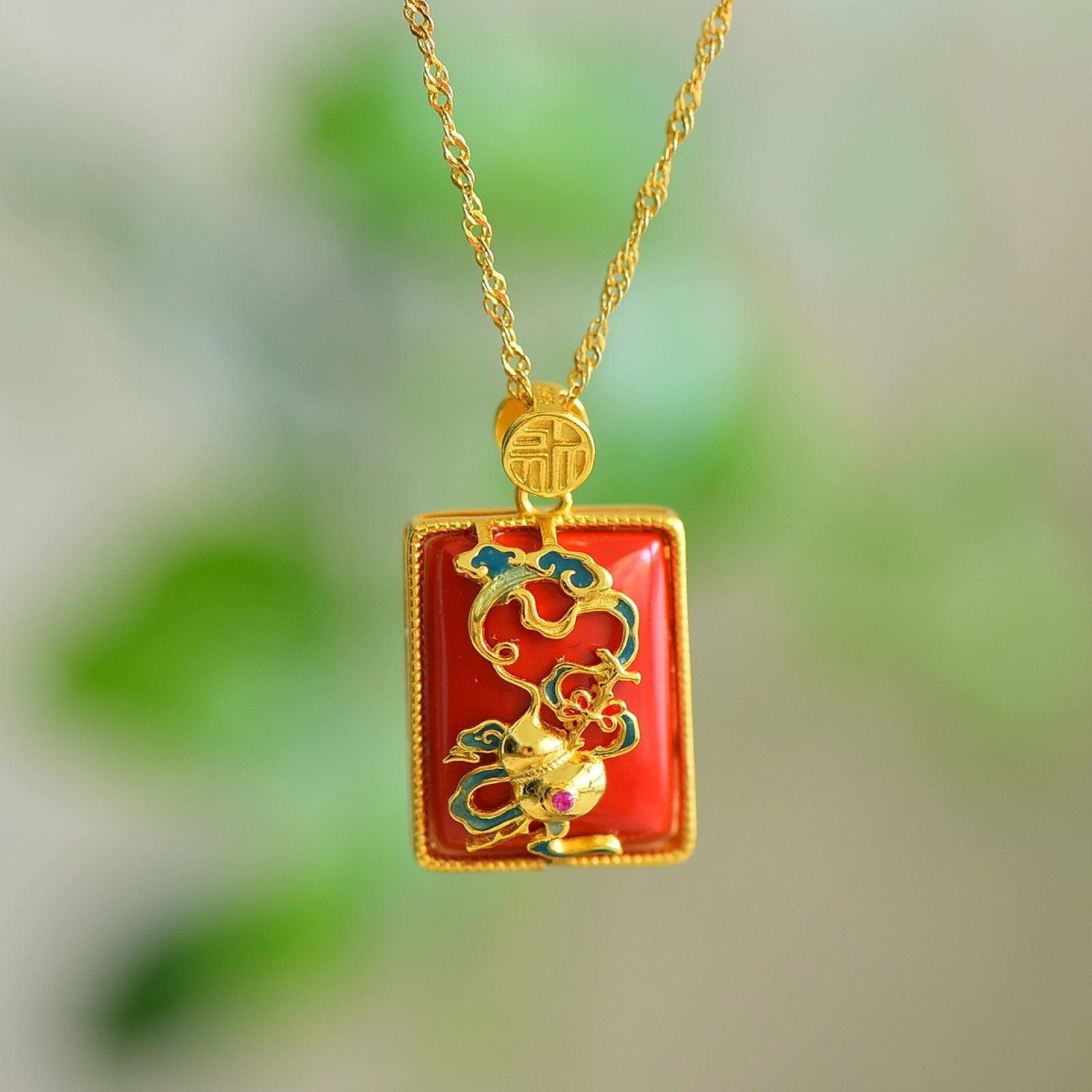 An Exquisite Sterling Silver-Gold Plated Inlaid Cinnabar Necklace: An Exquisite Sterling Silver-Gold Plated Inlaid Cinnabar Necklace,Size:0.5inx0.6in 纯银镀金镶朱砂项链