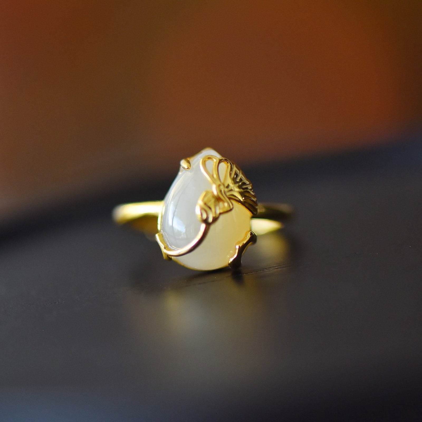 An Exquisite Sterling Silver-Gold Plated Inlaid White Jade Ring: An Exquisite Sterling Silver-Gold Plated Inlaid White Jade Ring,Size:0.4inx0.6in 纯银镀金镶白玉戒指
