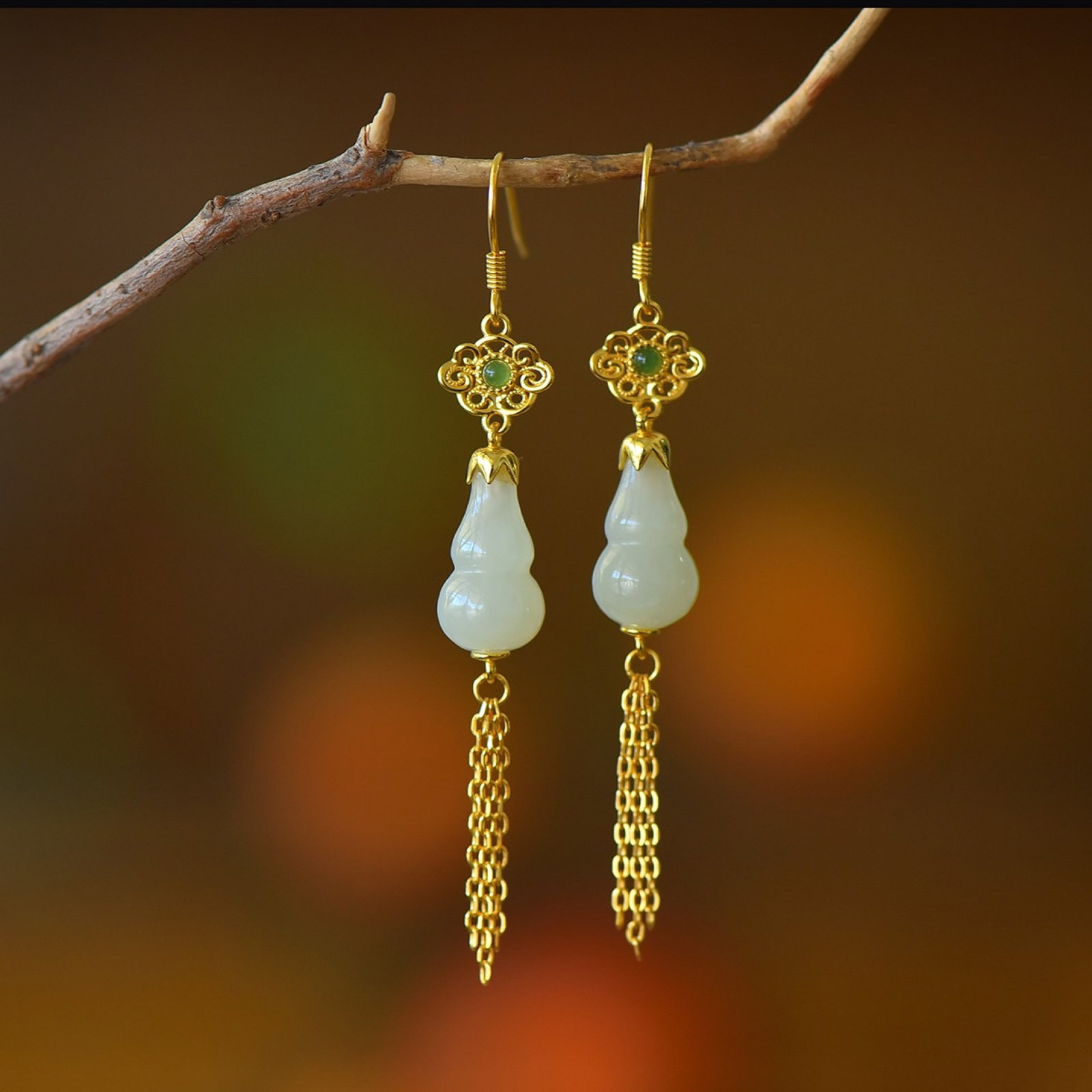 A Pair of Exquisite Sterling Silver-Gold Plated Inlaid White Jade Earrings: A Pair of Exquisite Sterling Silver-Gold Plated Inlaid White Jade Earrings 一对纯银镀金镶白玉耳环
