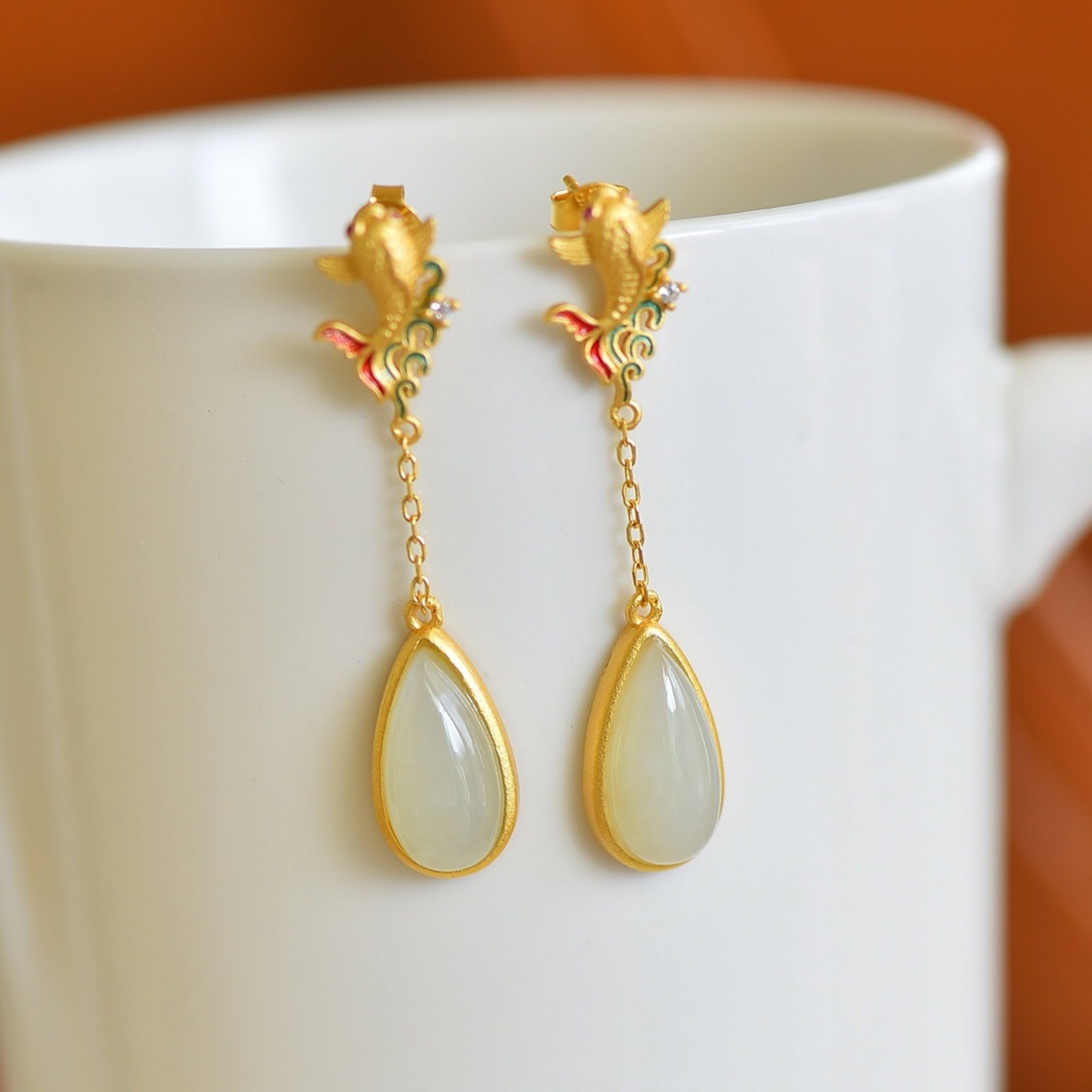A Pair of Exquisite Sterling Silver-Gold Plated Inlaid White Jade Earrings: A Pair of Exquisite Sterling Silver-Gold Plated Inlaid White Jade Earrings,Size:0.4inx0.5in 一对纯银镀金镶白玉耳环