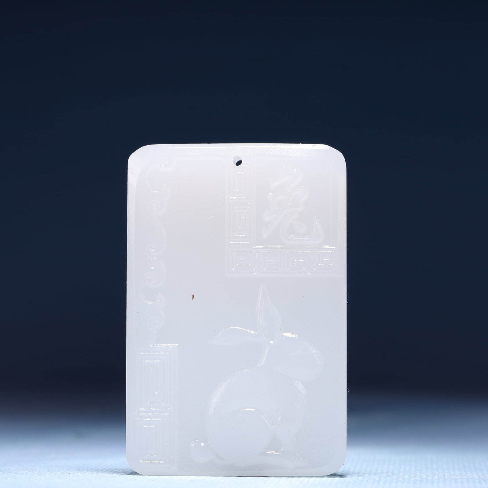 An Exquisite White Jade Rabbit Pattern Pendant: An Exquisite White Jade Rabbit Pattern Pendant,Size:1.6inx0.4inx2.4in,Weight:42g 白玉兔纹牌