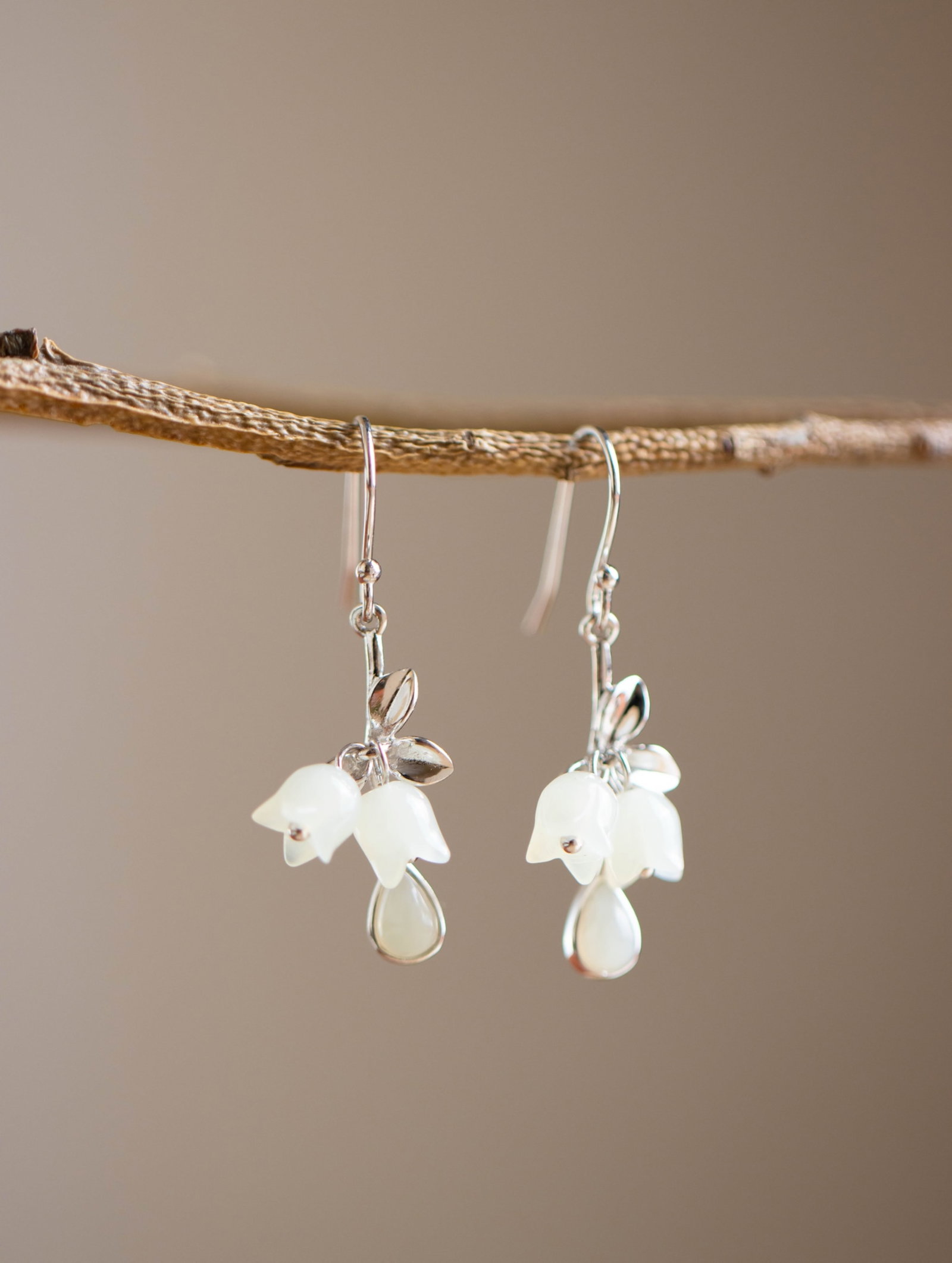 A Pair of Exquisite Sterling Silver Inlaid White Jade Earrings: A Pair of Exquisite Sterling Silver Inlaid White Jade Earrings 一对纯银镶白玉耳环