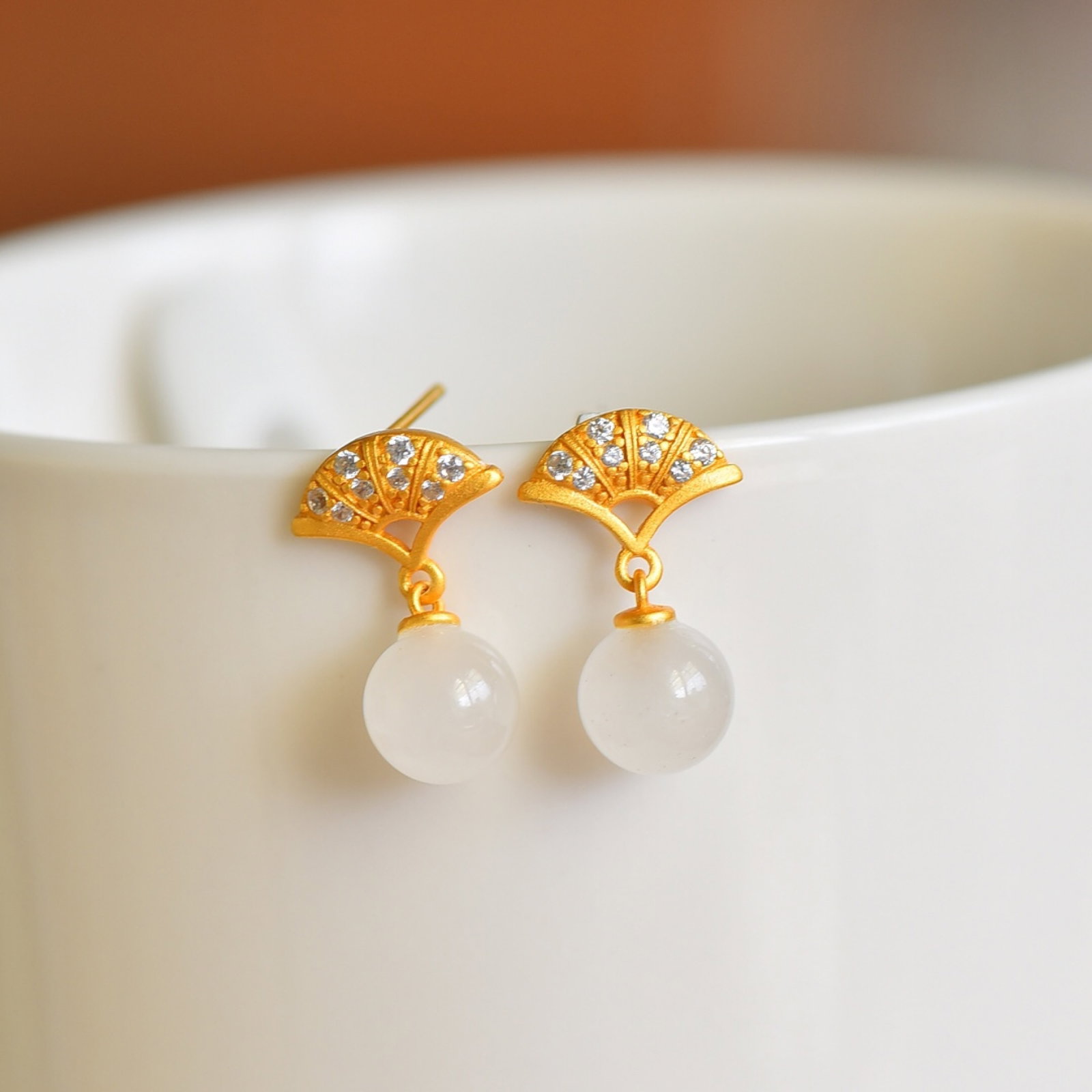 A Pair of Exquisite Sterling Silver-Gold Plated Inlaid White Jade Earrings: A Pair of Exquisite Sterling Silver-Gold Plated Inlaid White Jade Earrings , Size :0.3inx0.3in 一对纯银镀金镶白玉耳环,尺寸