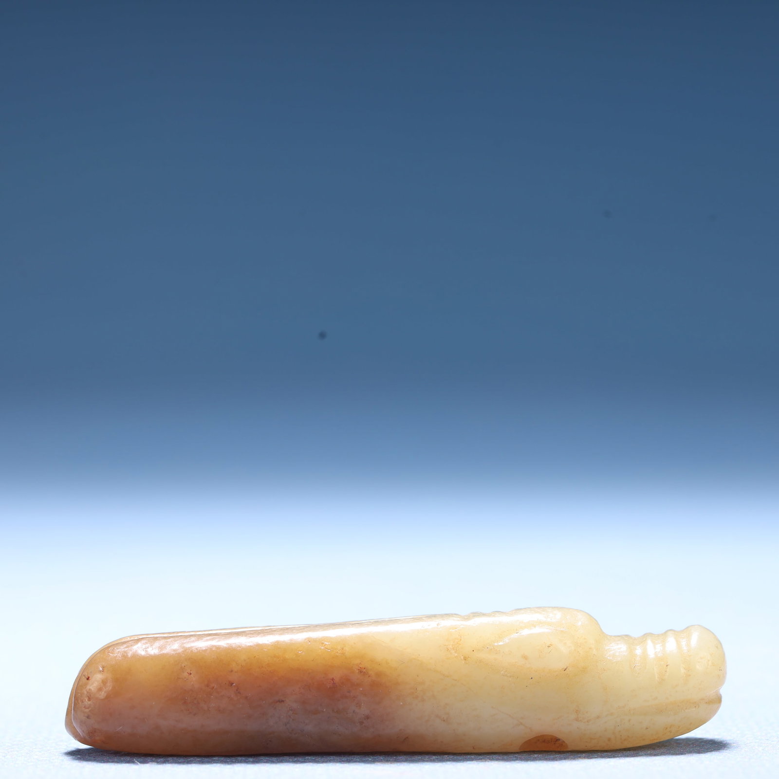 An Archaic Hongshan Culture White Jade Dragon Ornament: An Archaic Hongshan Culture White Jade Dragon Ornament,Ancient Time,China,Size:2.3inx0.4inx0.5in,Weight:17.3g