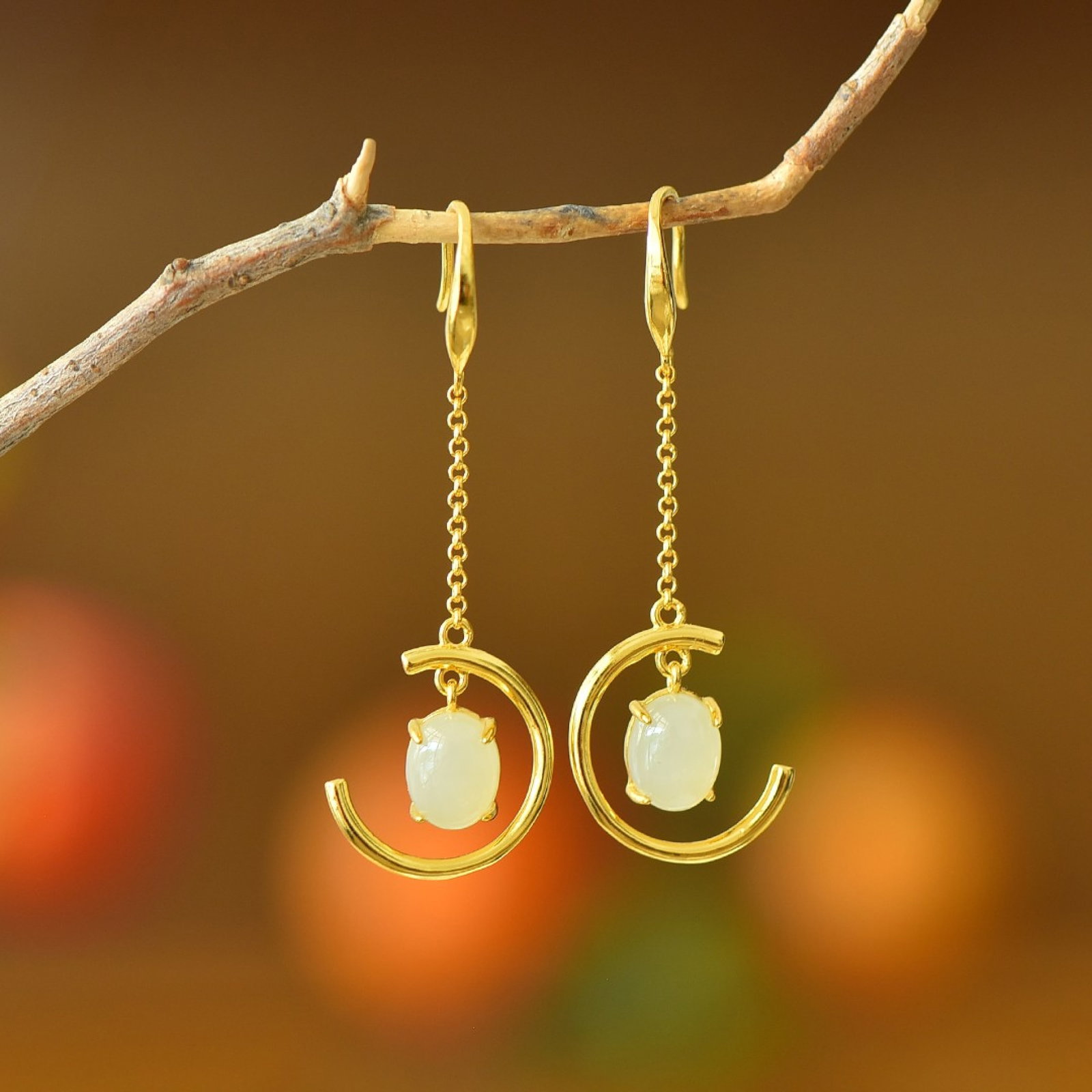A Pair of Exquisite Sterling Silver-Gold Plated Inlaid White Jade Earrings: A Pair of Exquisite Sterling Silver-Gold Plated Inlaid White Jade Earrings,Size:0.3inx0.4in 一对纯银镀金镶白玉耳环