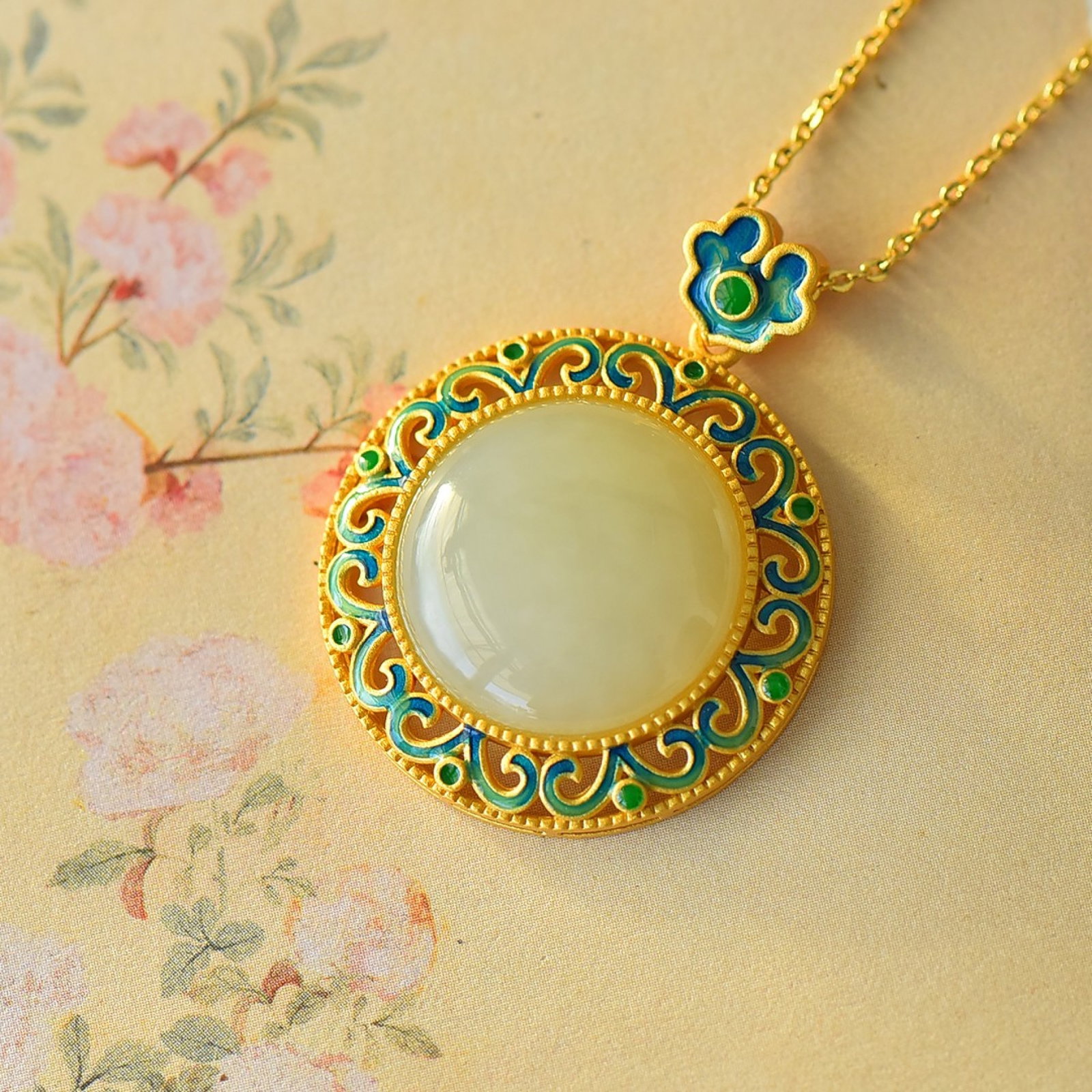 An Exquisite Sterling Silver-Gold Plated Inlaid White Jade Pendant: An Exquisite Sterling Silver-Gold Plated Inlaid White Jade Pendant 纯银镀金镶白玉吊坠