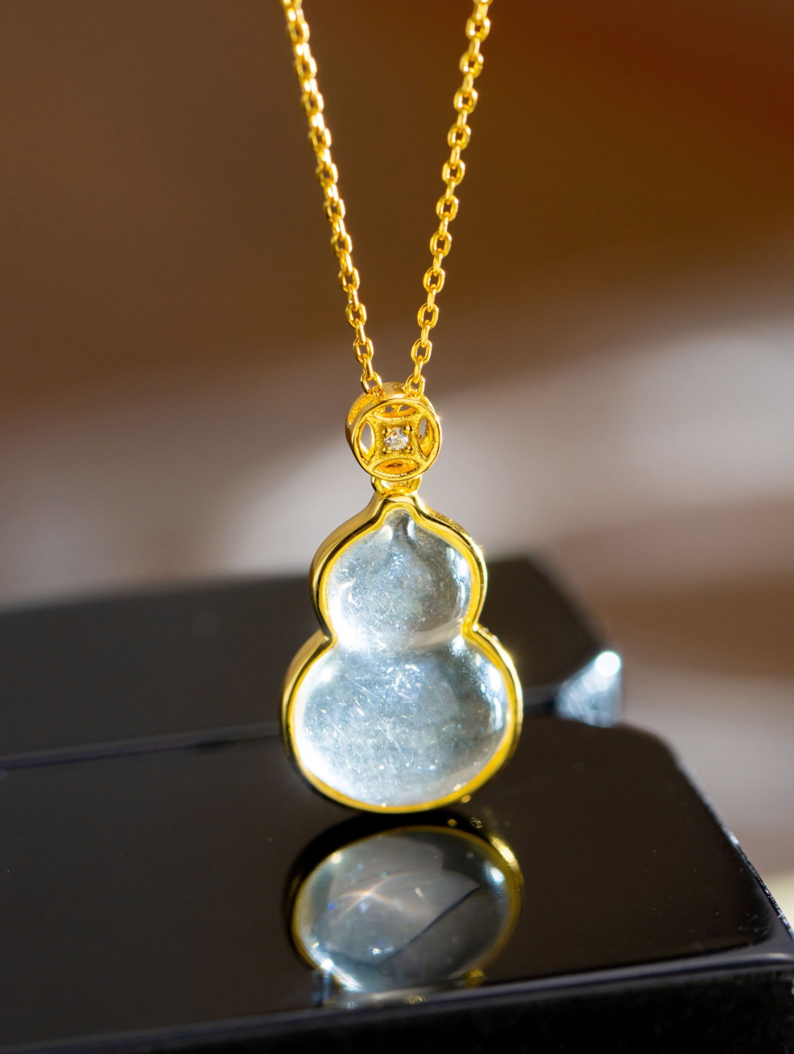 An Exquisite Sterling Silver-Gold Plated Inlaid Crystal Gourd Pendant: An Exquisite Sterling Silver-Gold Plated Inlaid Crystal Gourd Pendant 纯银镀金镶水晶葫芦吊坠